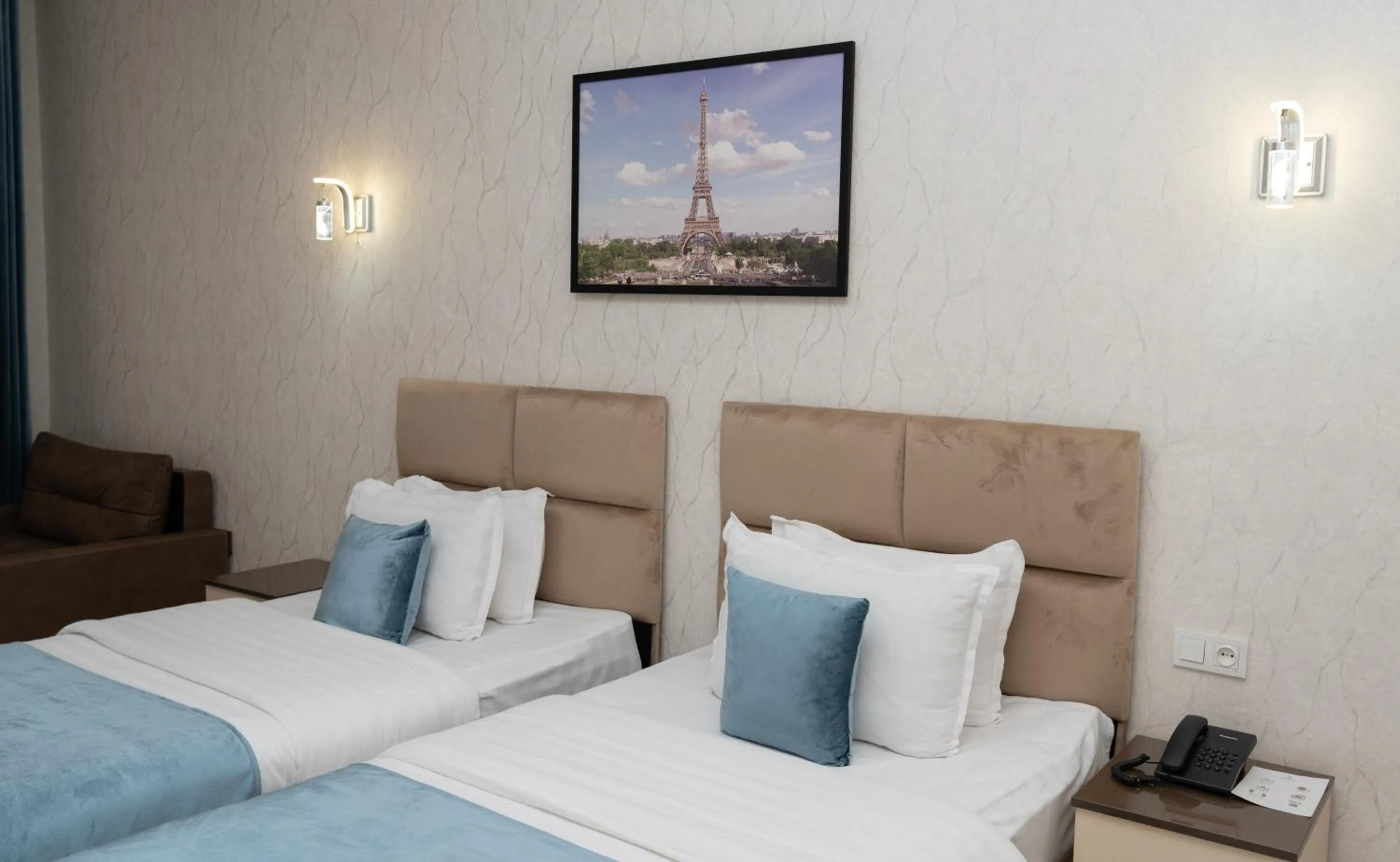 Bed in The Tower Hotel Tashkent by HotelPro Group