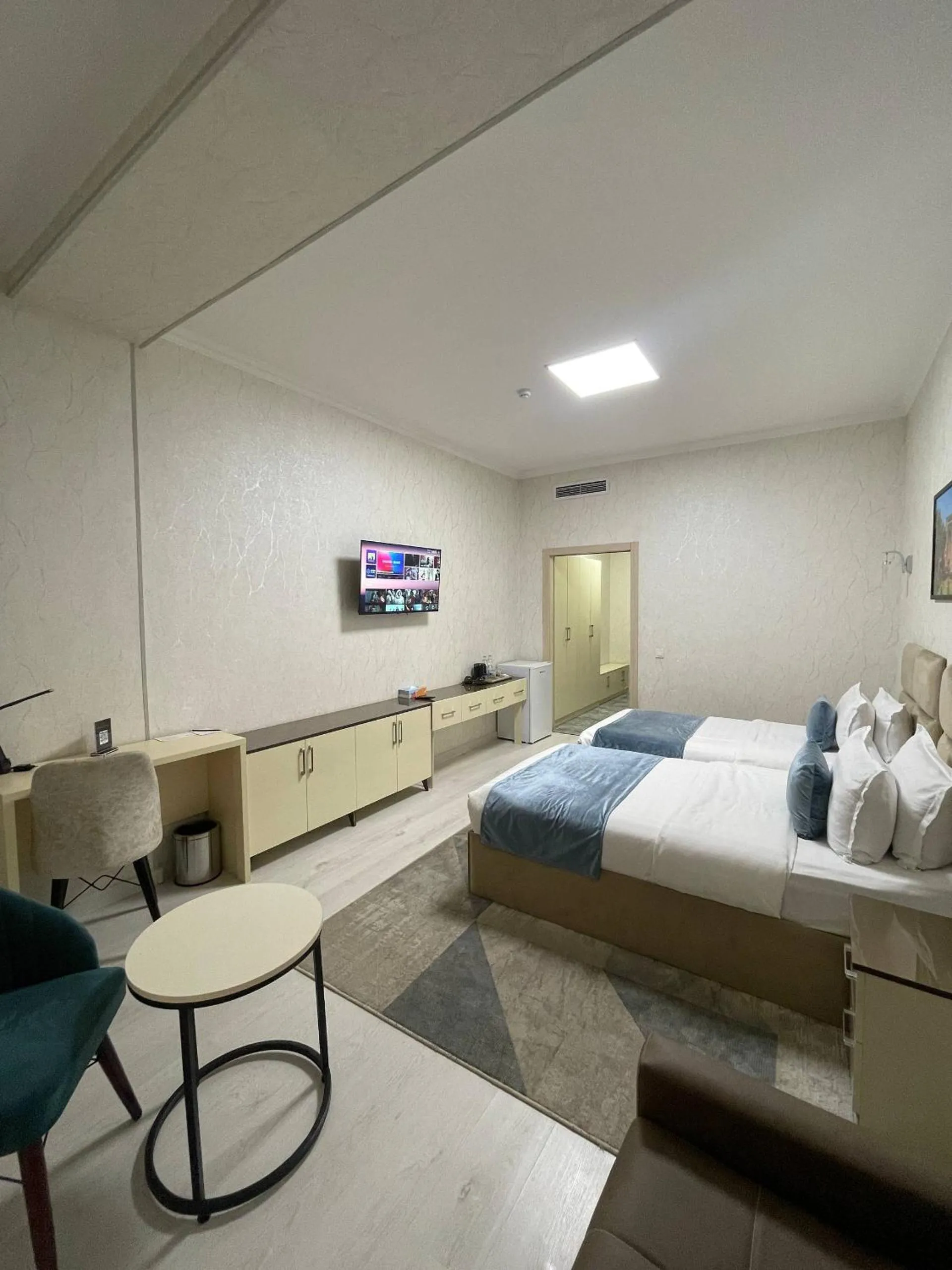 Bed in The Tower Hotel Tashkent by HotelPro Group