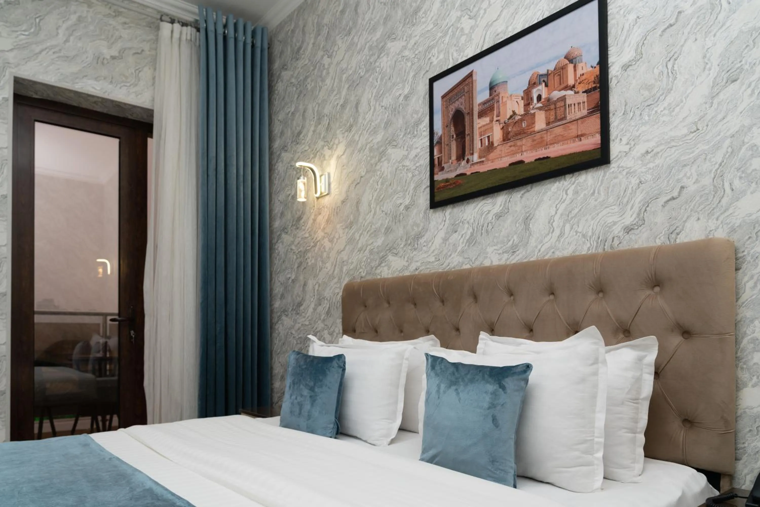 Bed in The Tower Hotel Tashkent by HotelPro Group
