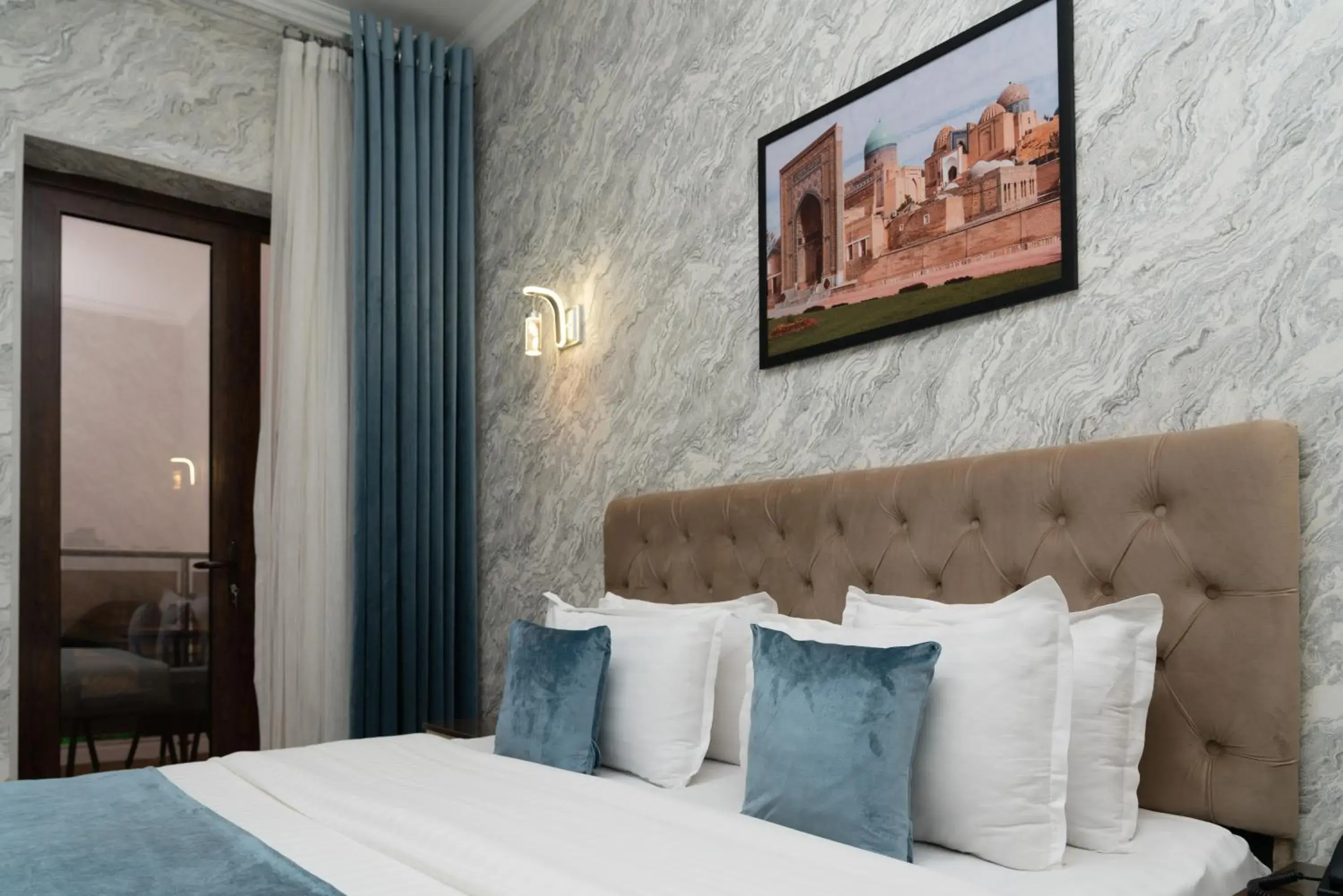 Bed in The Tower Hotel Tashkent by HotelPro Group Bed in The Tower Hotel Tashkent by HotelPro Group