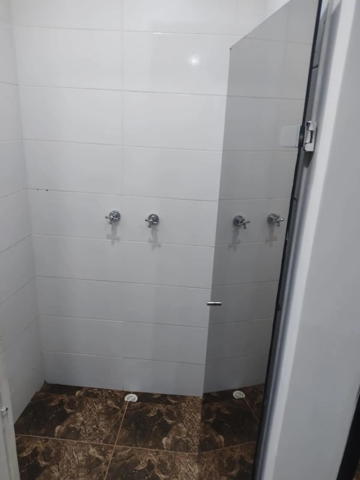 Shower in Hotel Spa Laureles