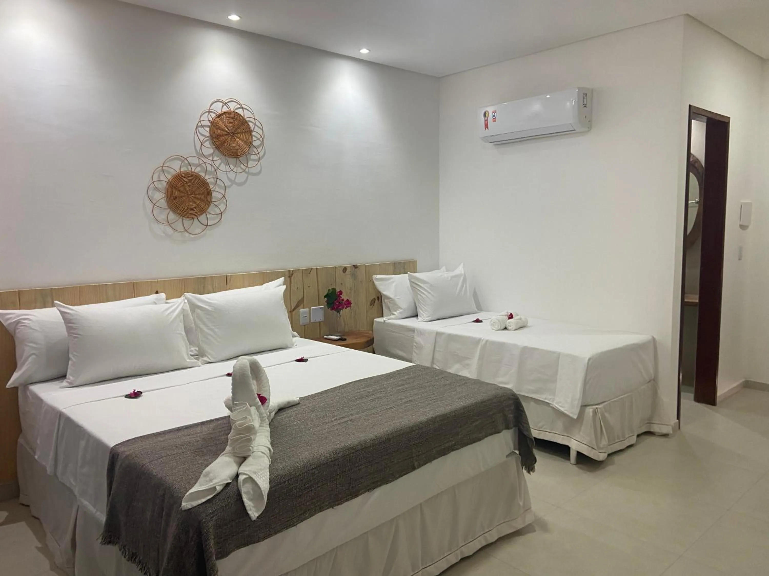 Bed in Pousada Canouan