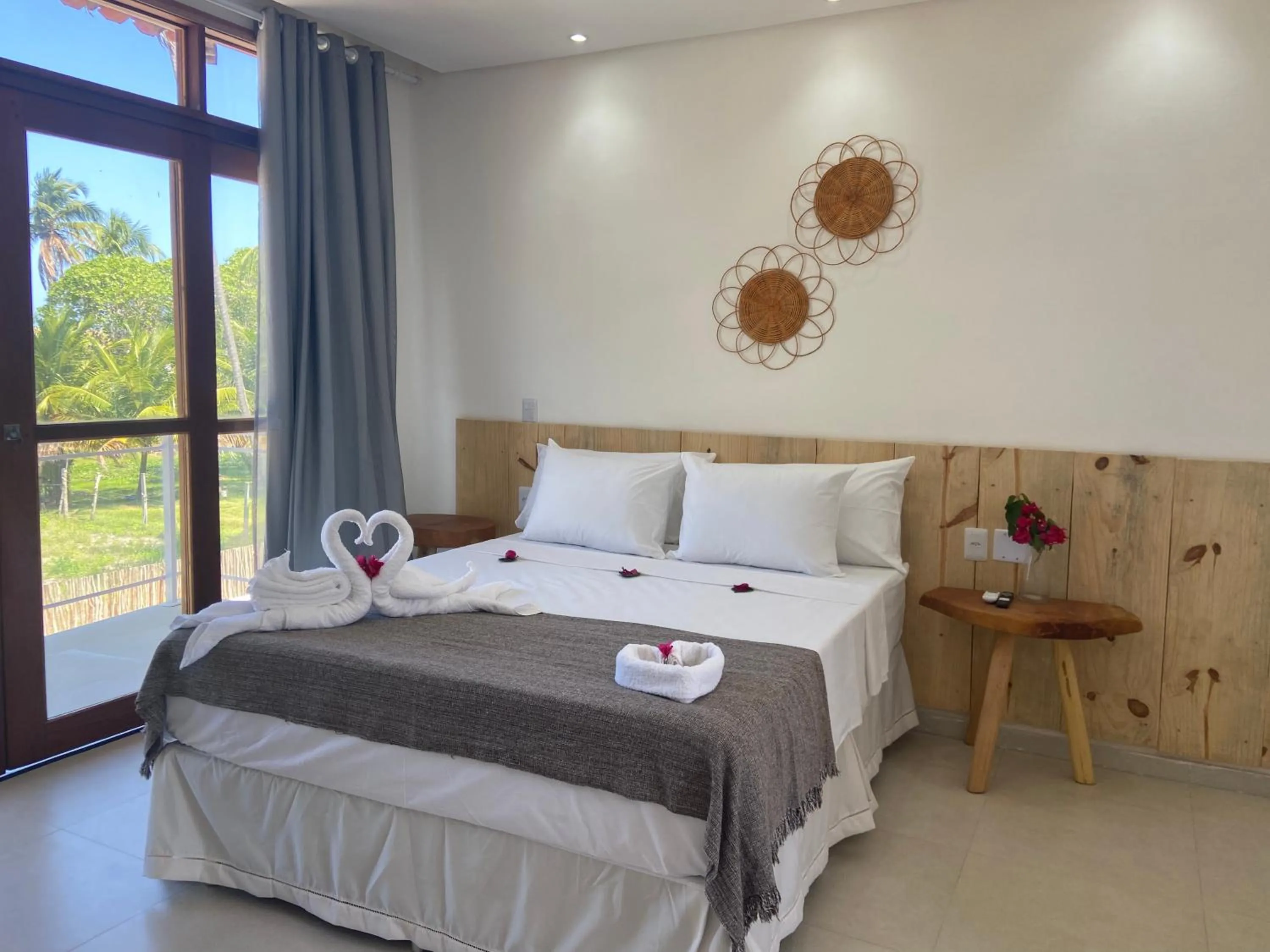 Bed in Pousada Canouan