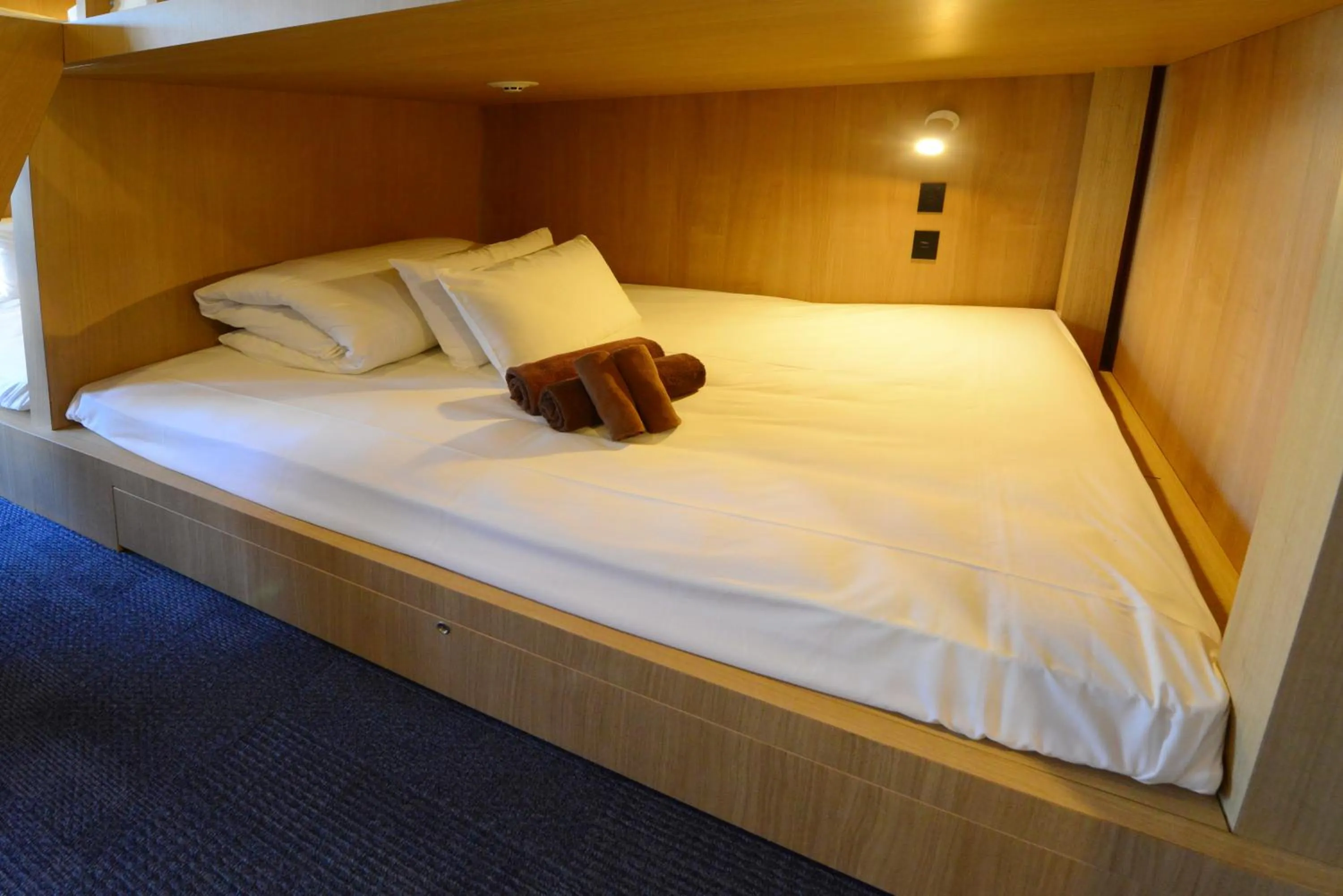 Bed in THE BONDS HOTEL TOKYO