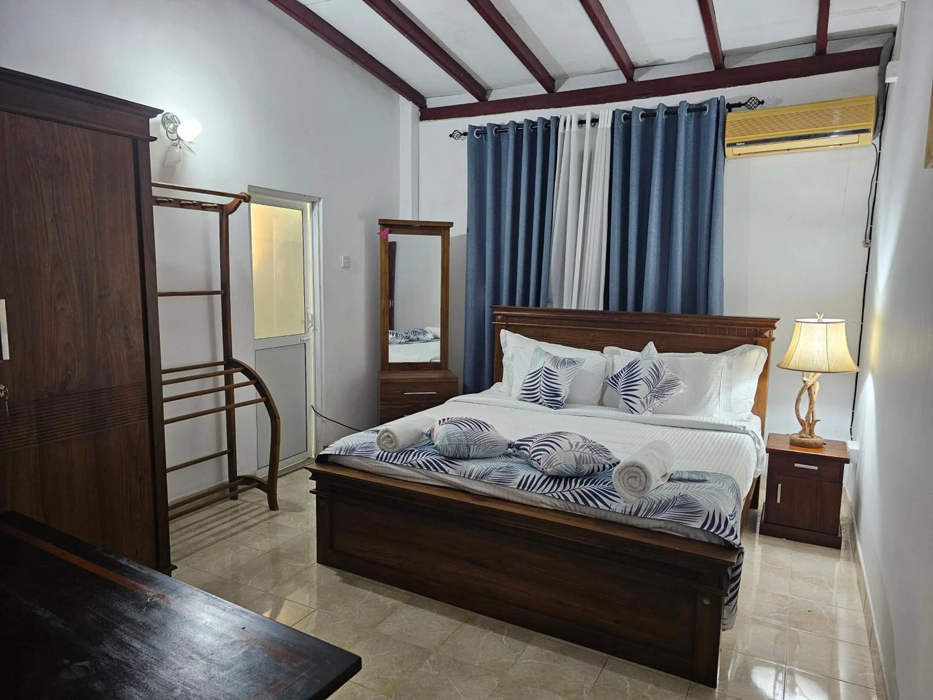 Bed in Ellakanda Nature Villa
