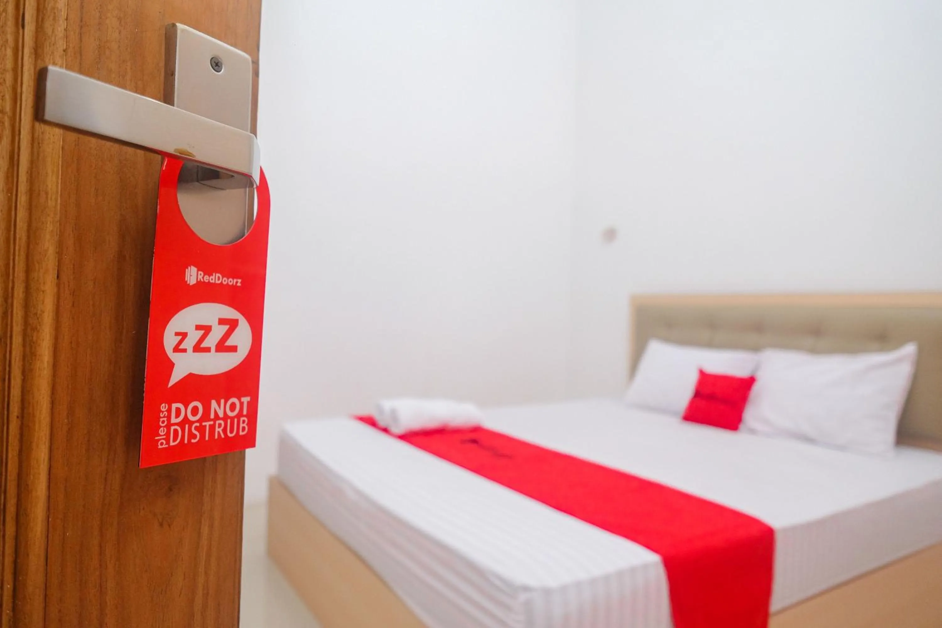 Bed in RedDoorz Syariah near Alun Alun Temanggung