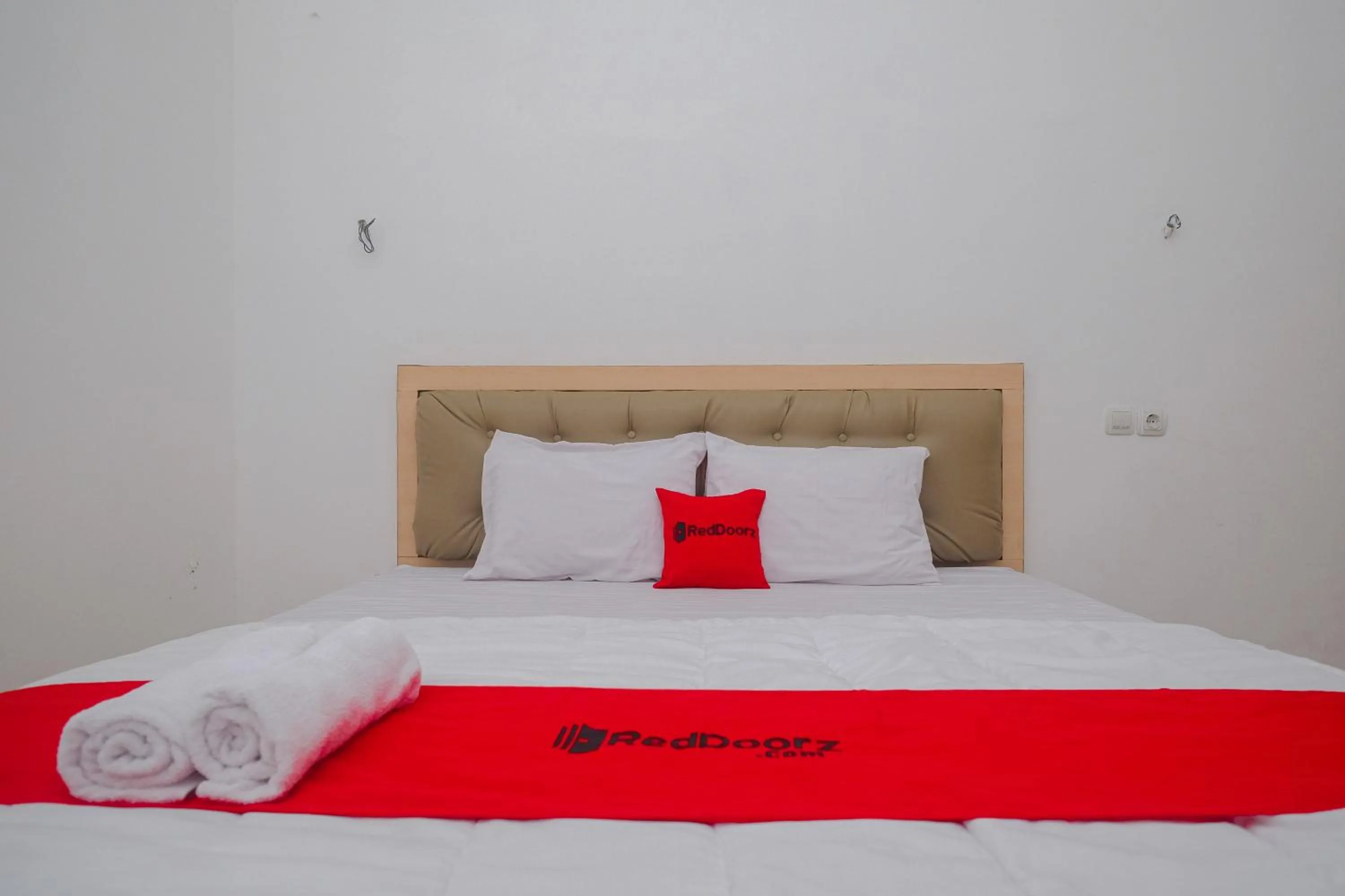 Bed in RedDoorz Syariah near Alun Alun Temanggung