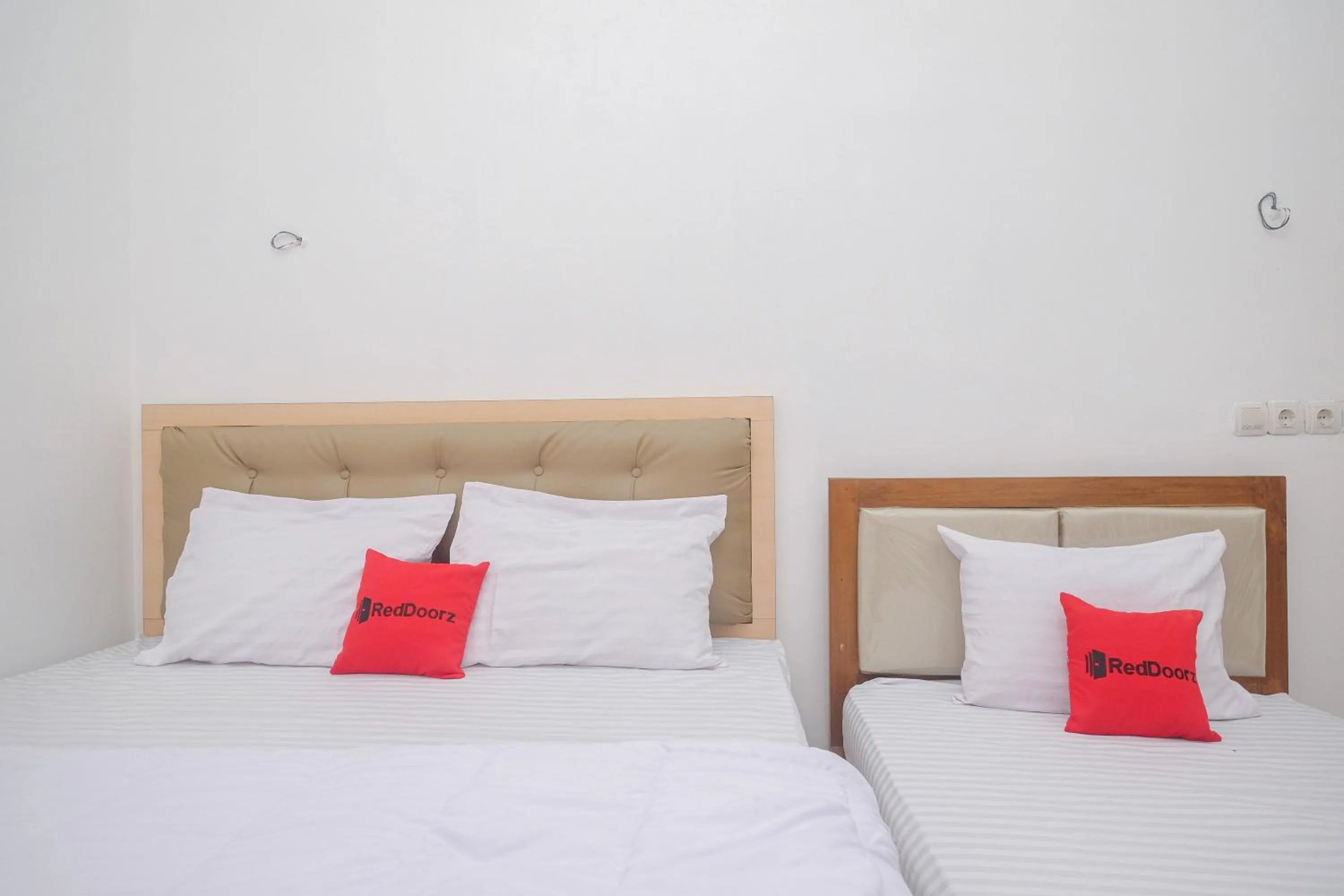 Bed in RedDoorz Syariah near Alun Alun Temanggung