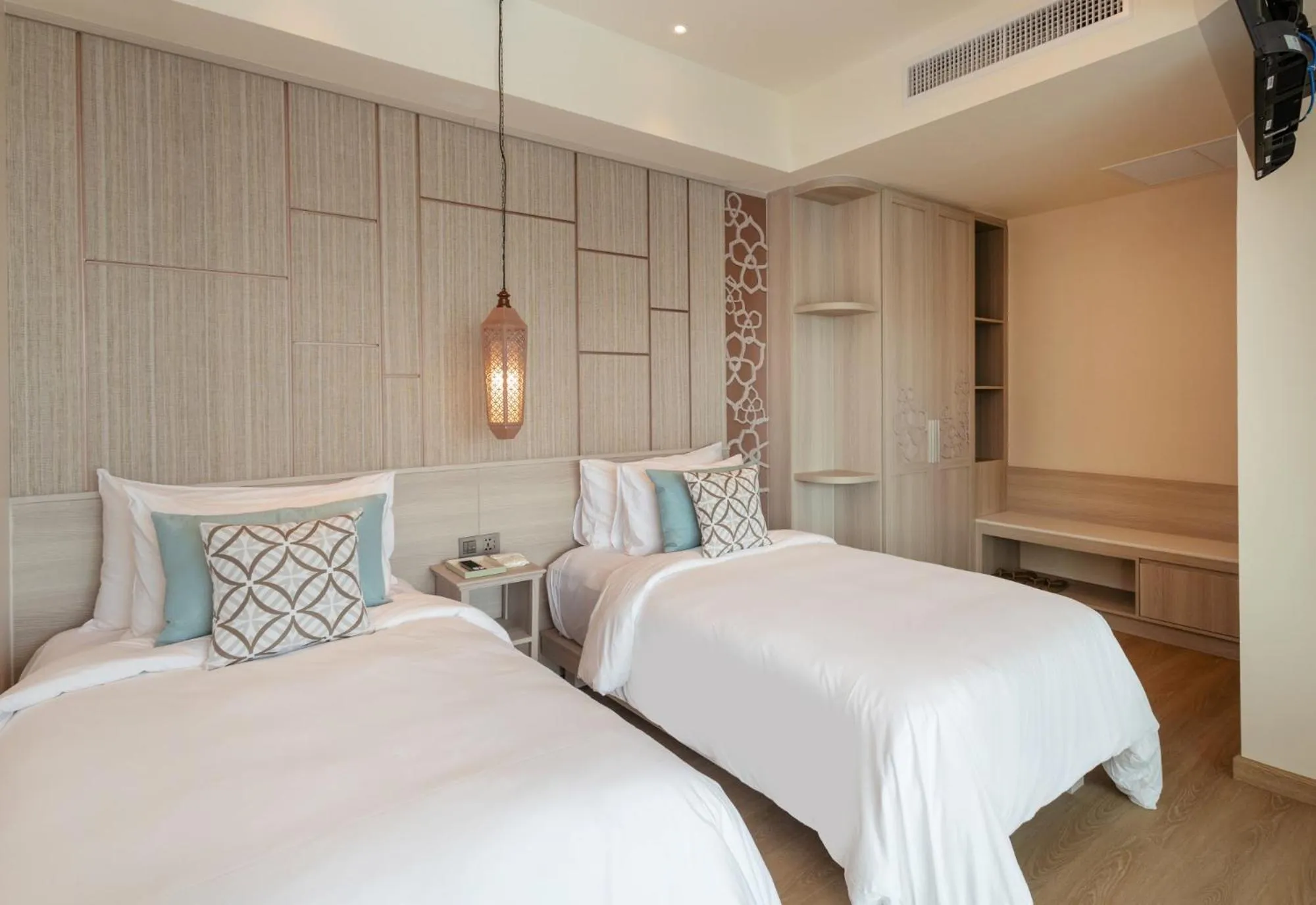 Bed in The Little Shore Khao Lak by Katathani