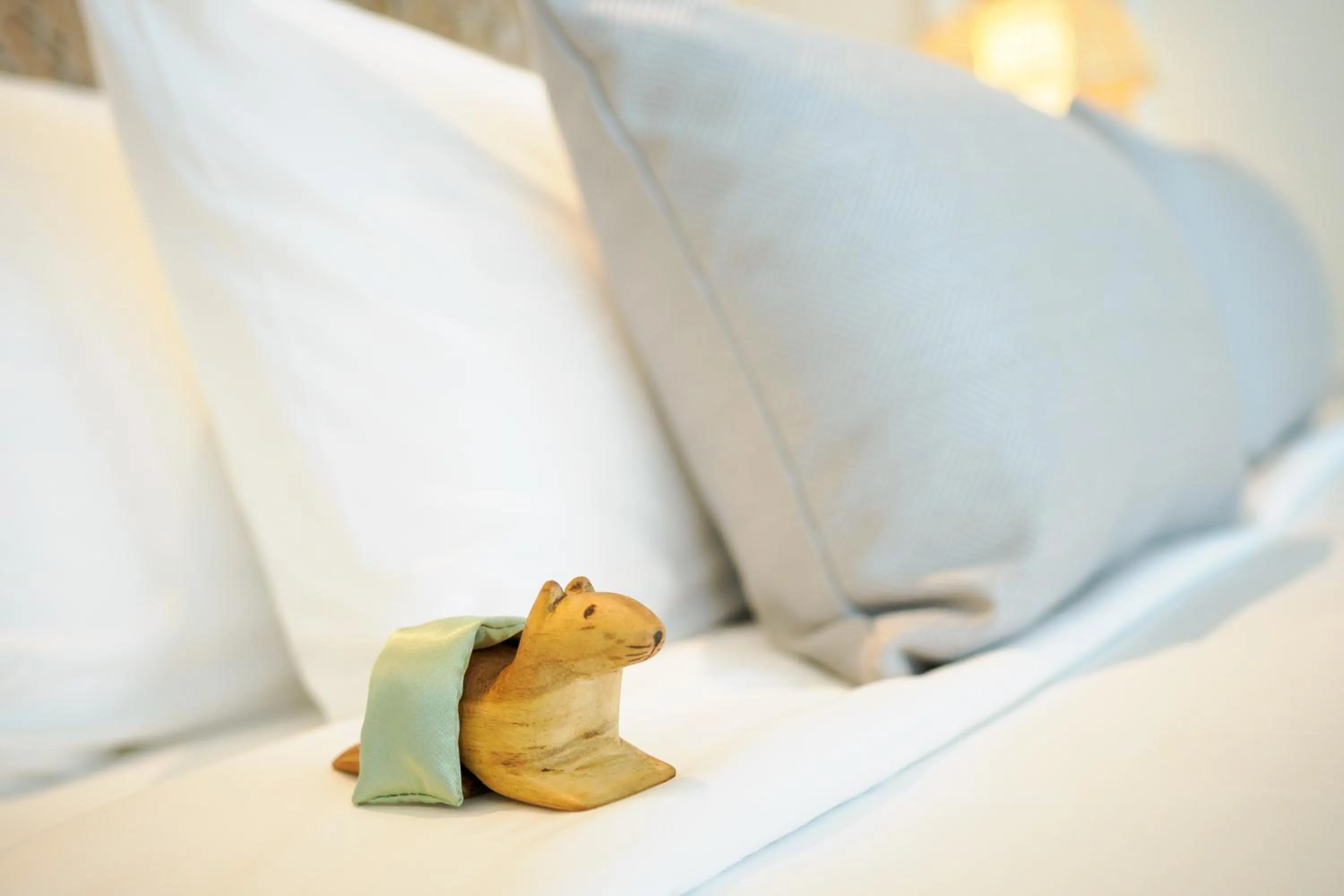 Bed in The Little Shore Khao Lak by Katathani