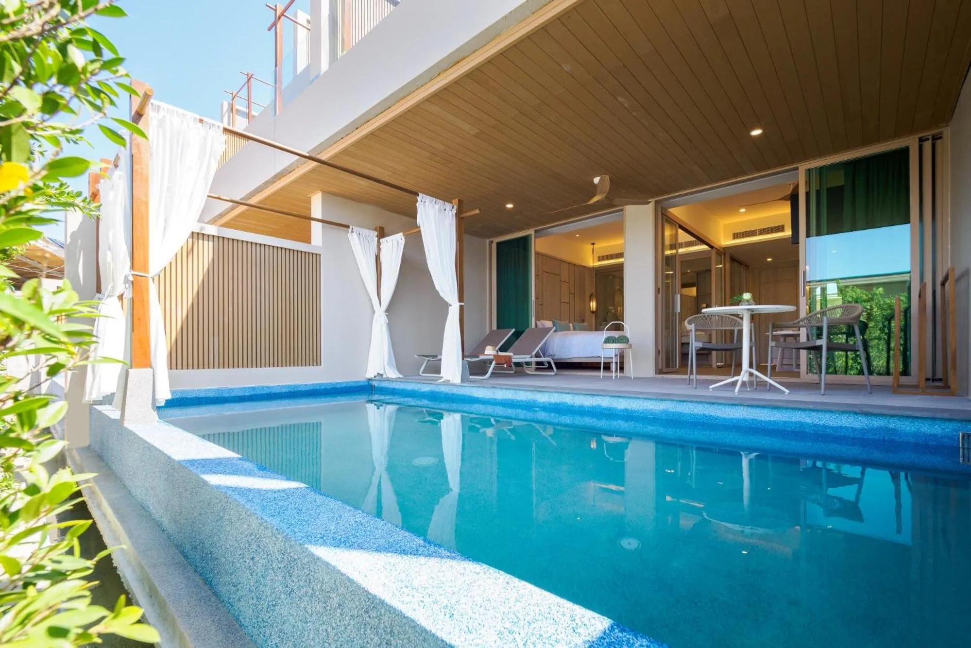 Pool view in The Little Shore Khao Lak by Katathani