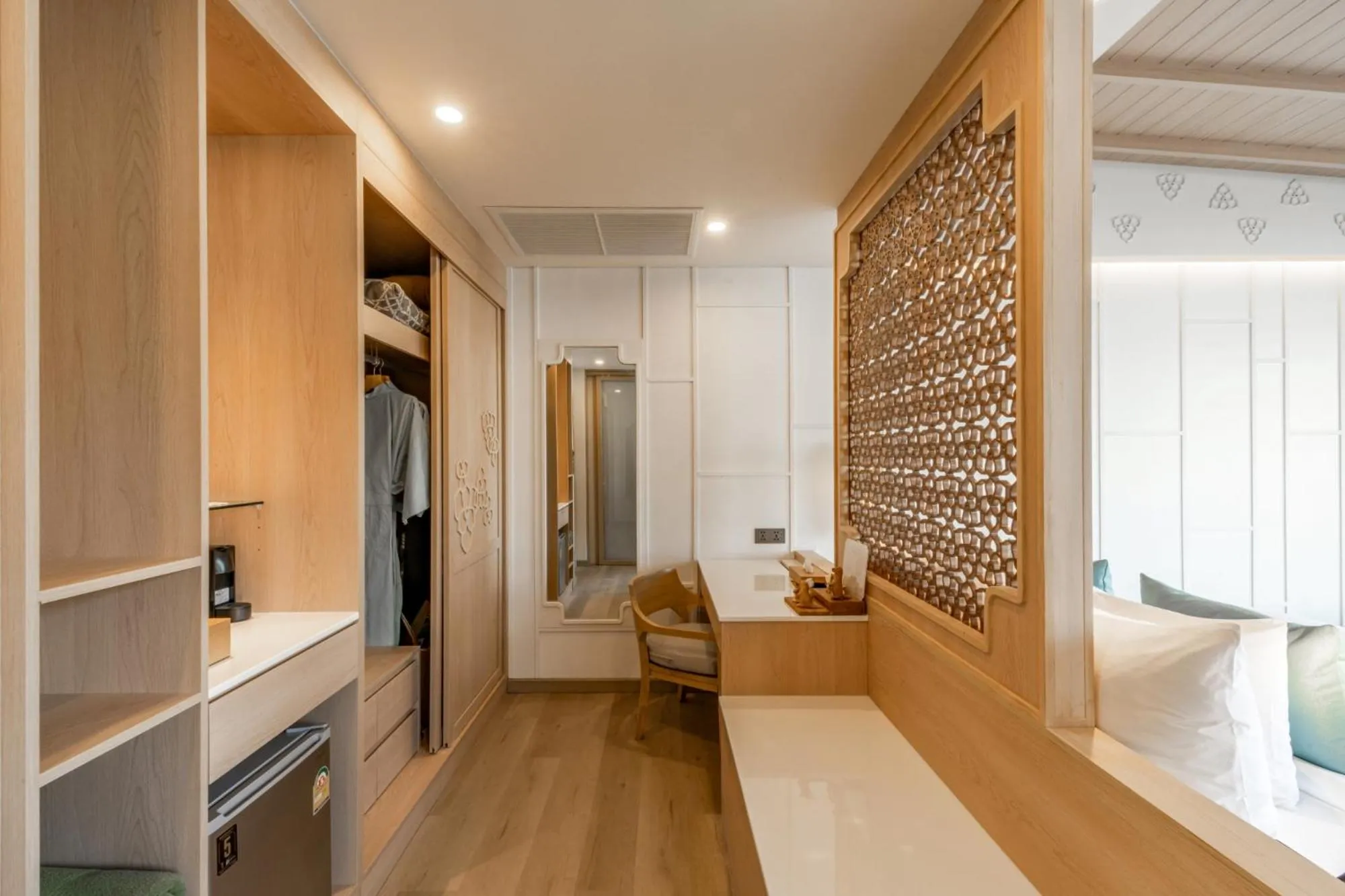 Seating area in The Little Shore Khao Lak by Katathani