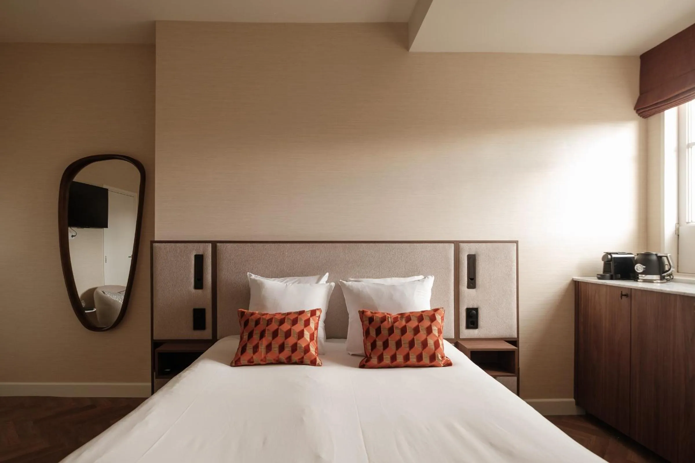 Bed in Parklane Hotel