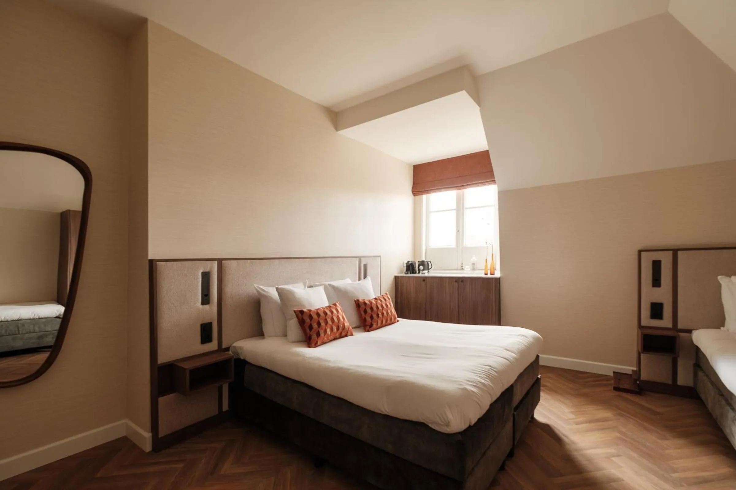 Bed in Parklane Hotel