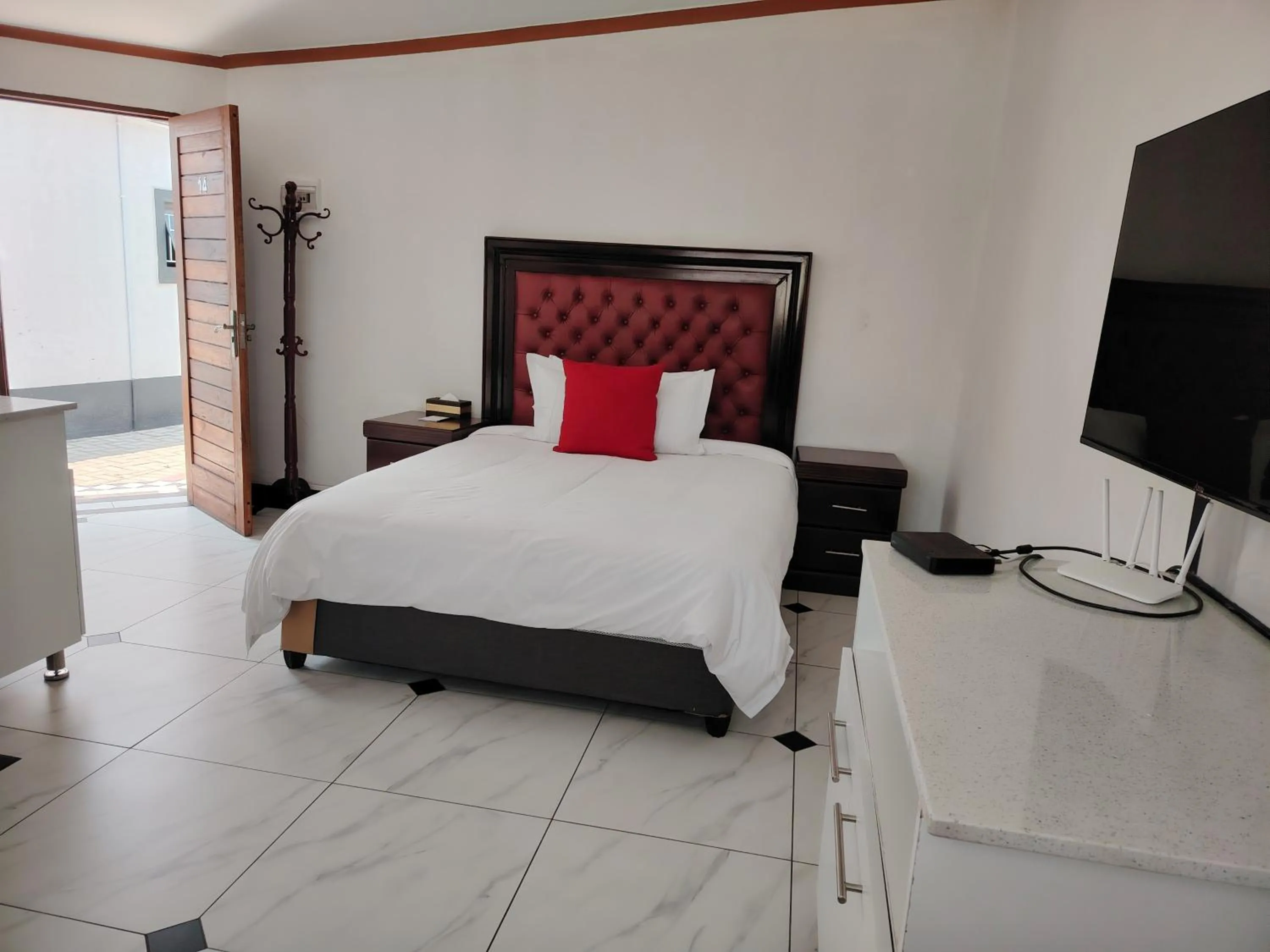 Bed in 4th Avenue Themepark & Lodge