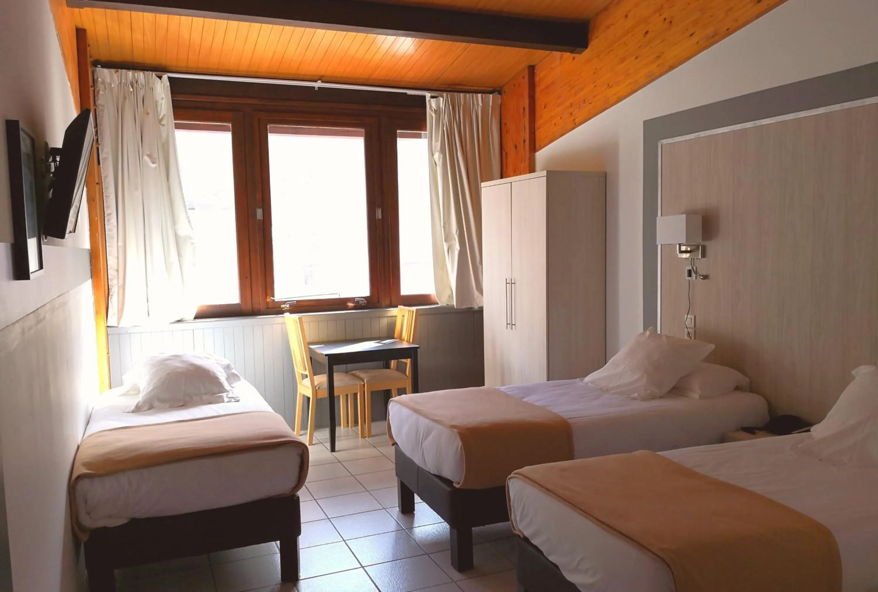 Photo of the whole room, Bed in Hôtel Les Sources