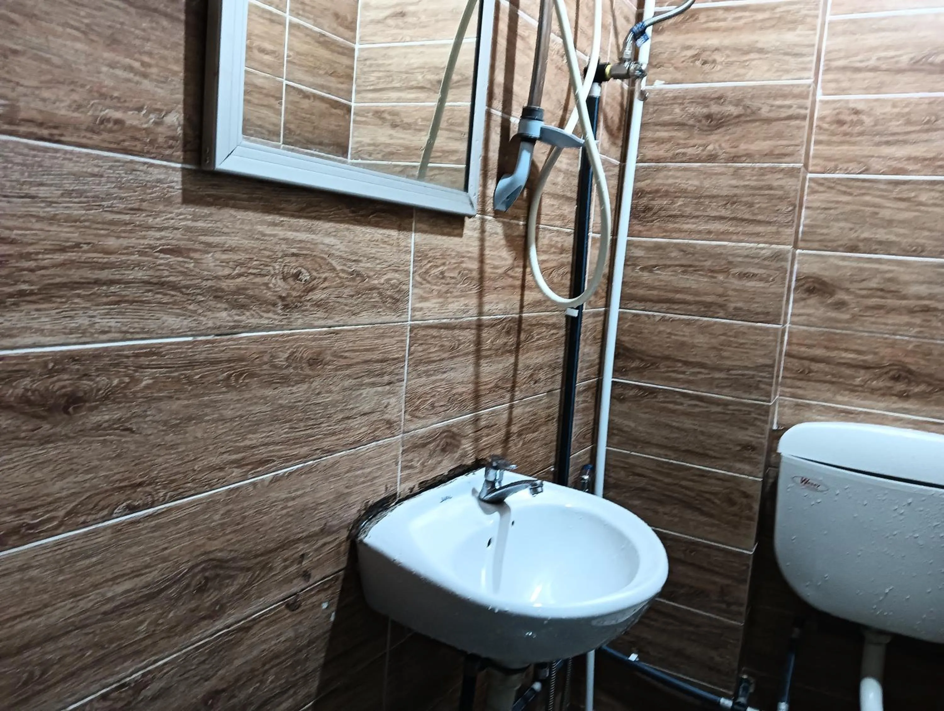 Bathroom in Hotel O Hi Inn 2