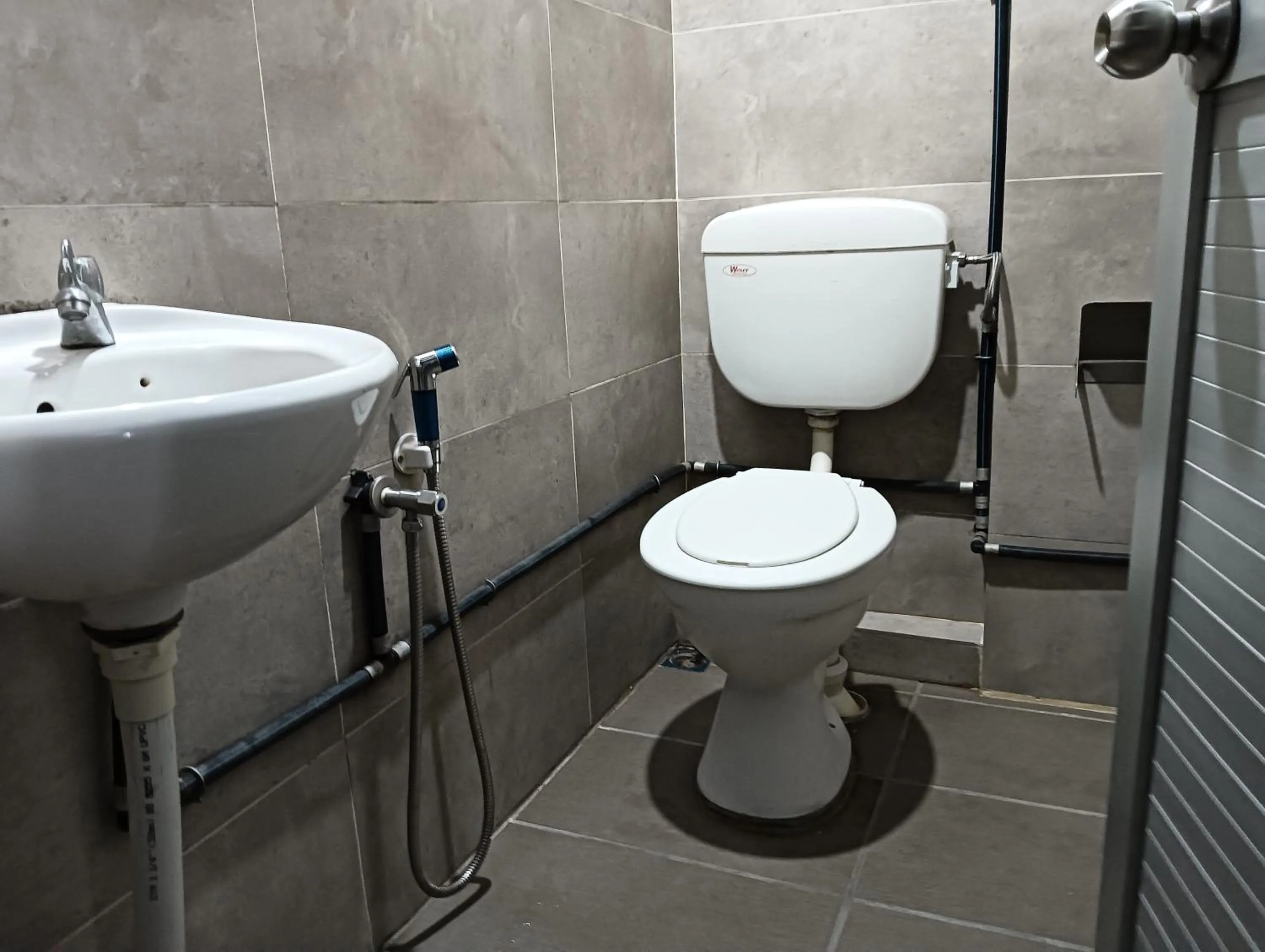 Bathroom in Hotel O Hi Inn 2