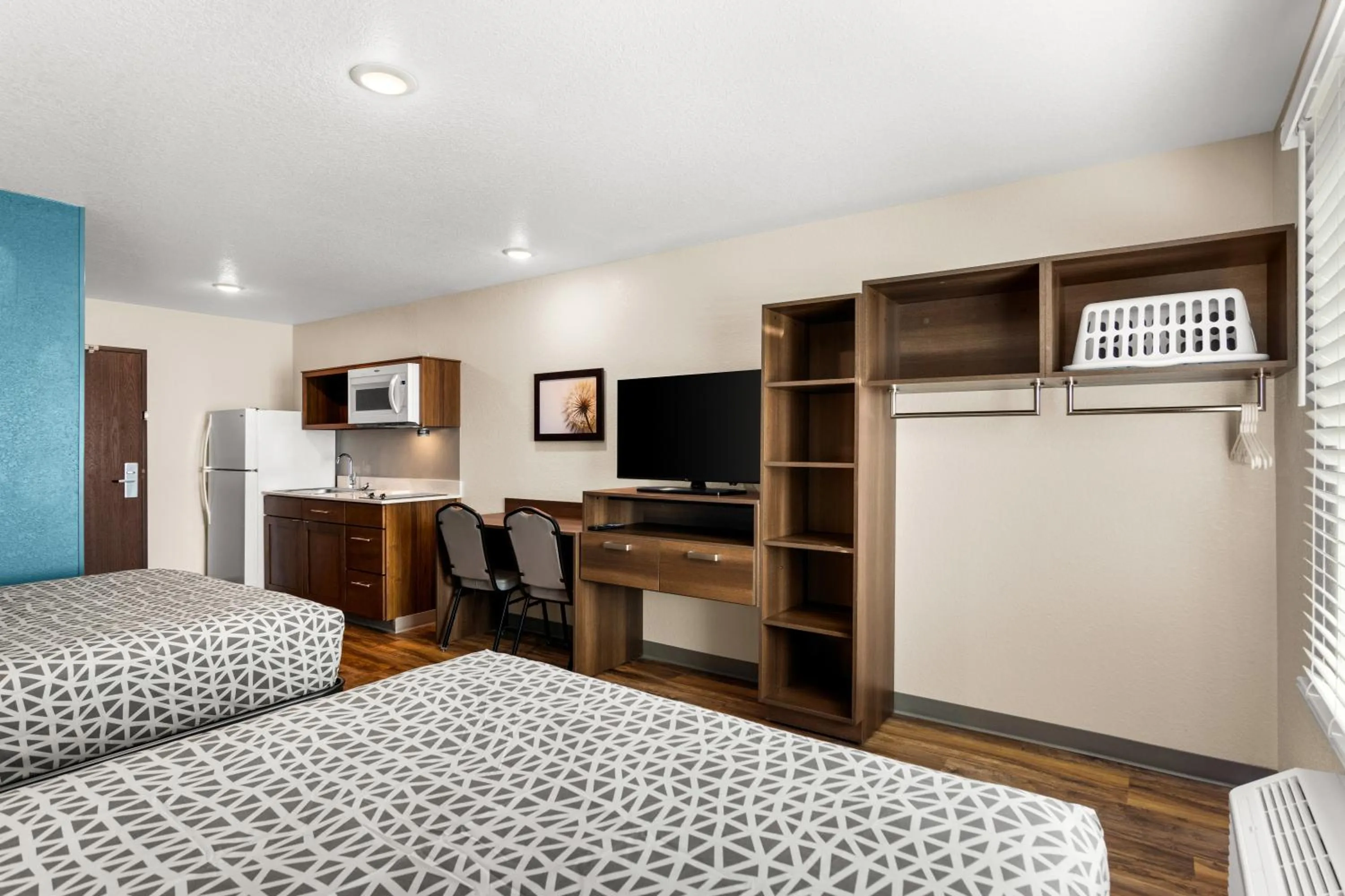 Bed in WoodSpring Suites Port St Lucie