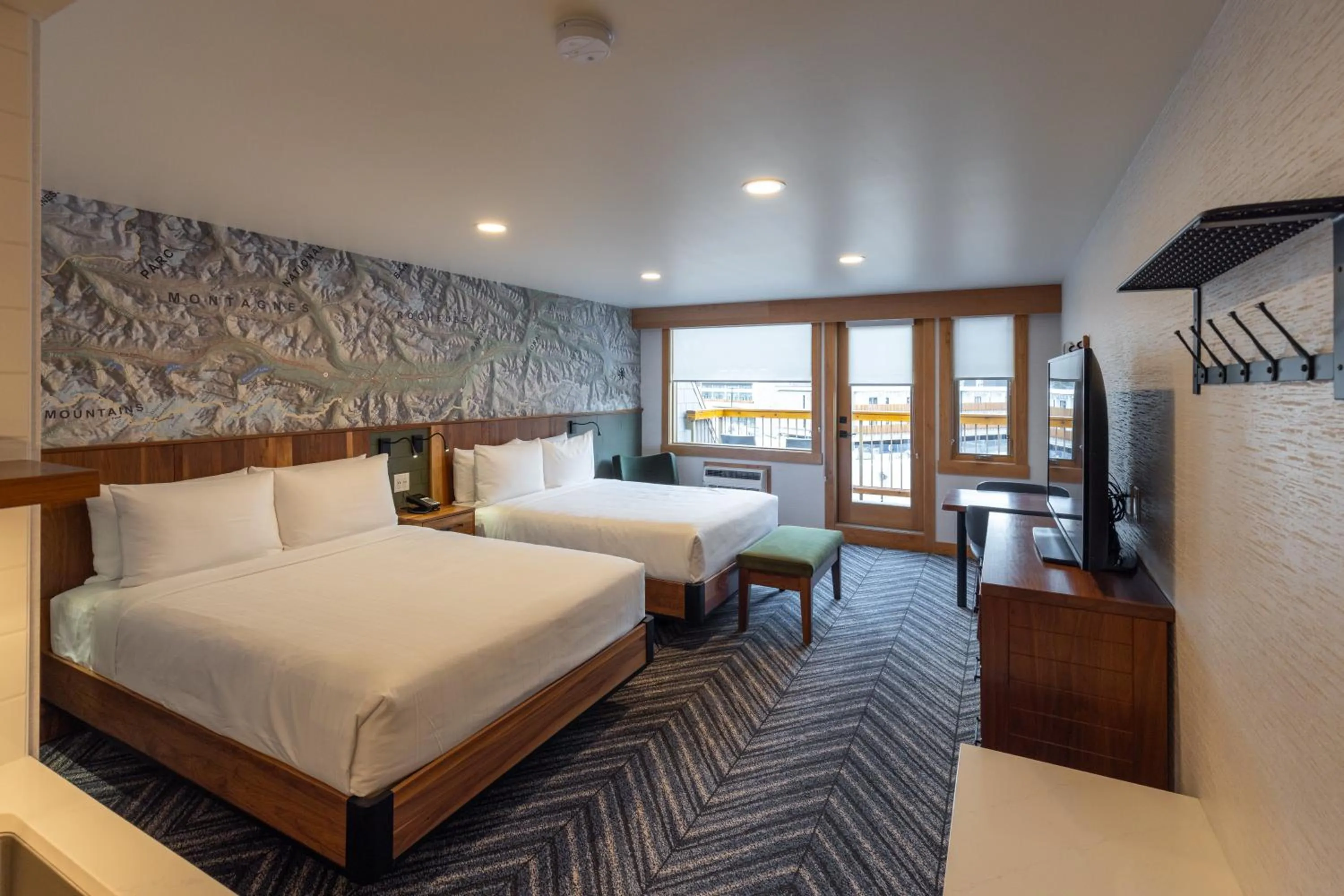 Bed in Hotel Canoe and Suites