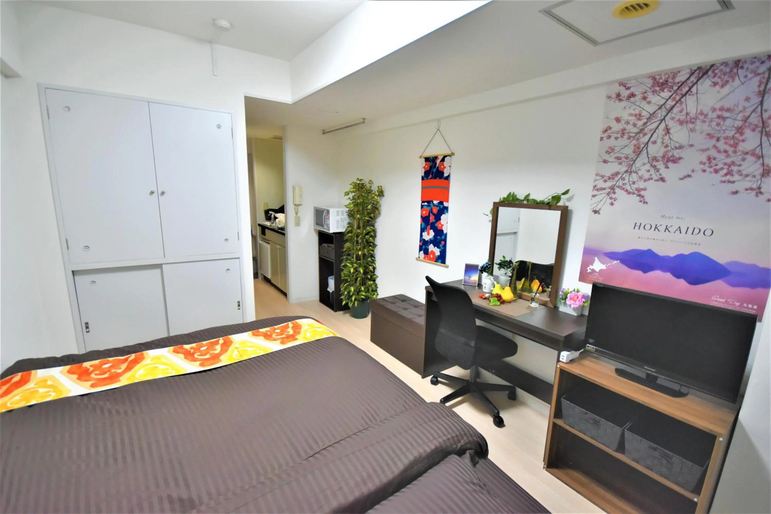 Photo of the whole room, Bed in KIYAZA City Sapporo CALIDO