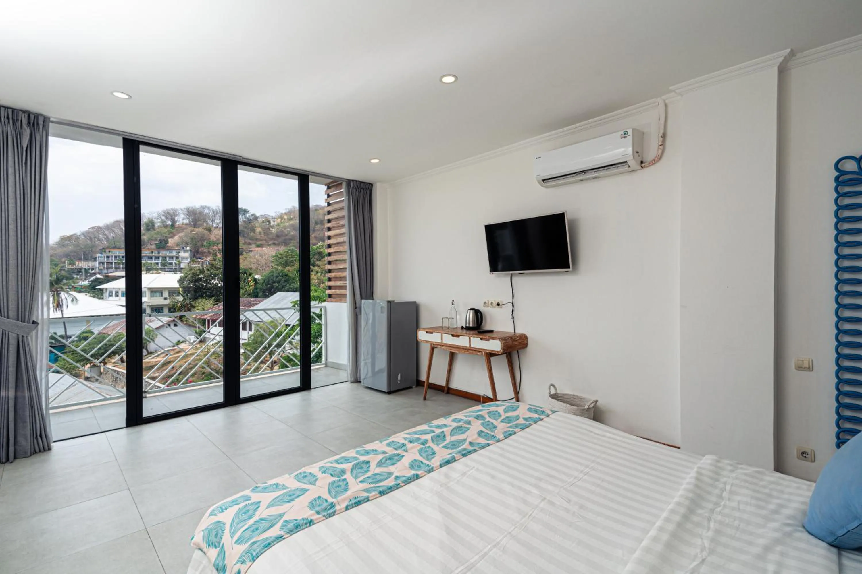 Bedroom, Bed in Komodo Suites Downtown