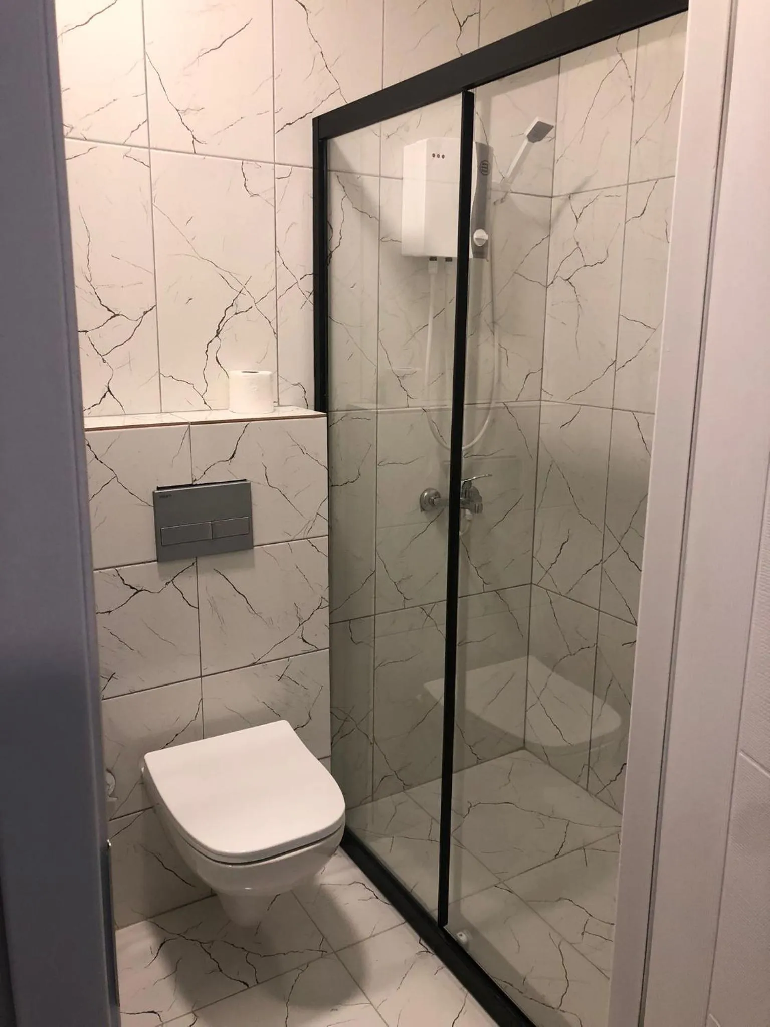 Shower in RED FLAG HOTEL