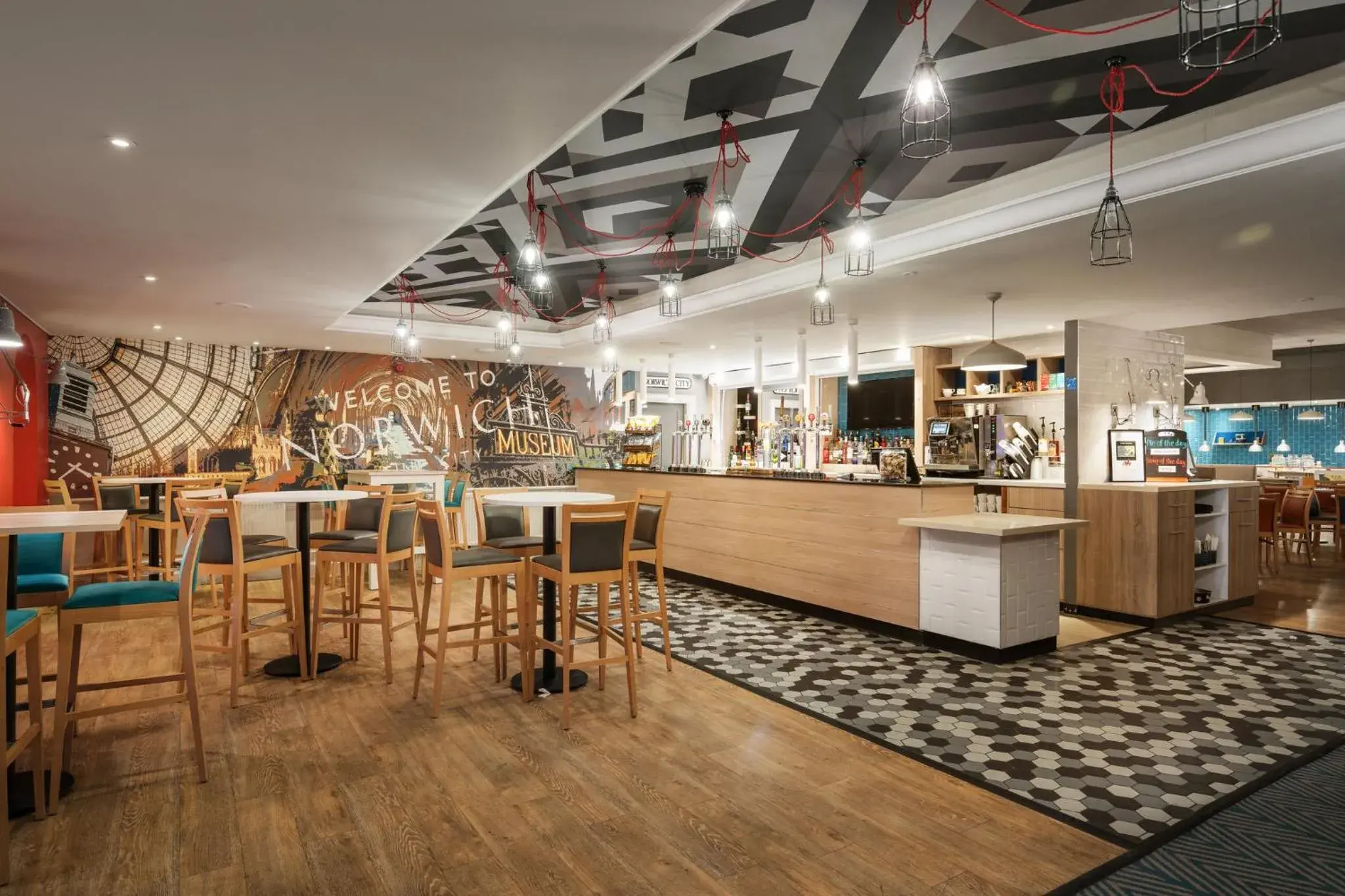 Lounge or bar in Holiday Inn Norwich North by IHG Lounge or bar in Holiday Inn Norwich North by IHG