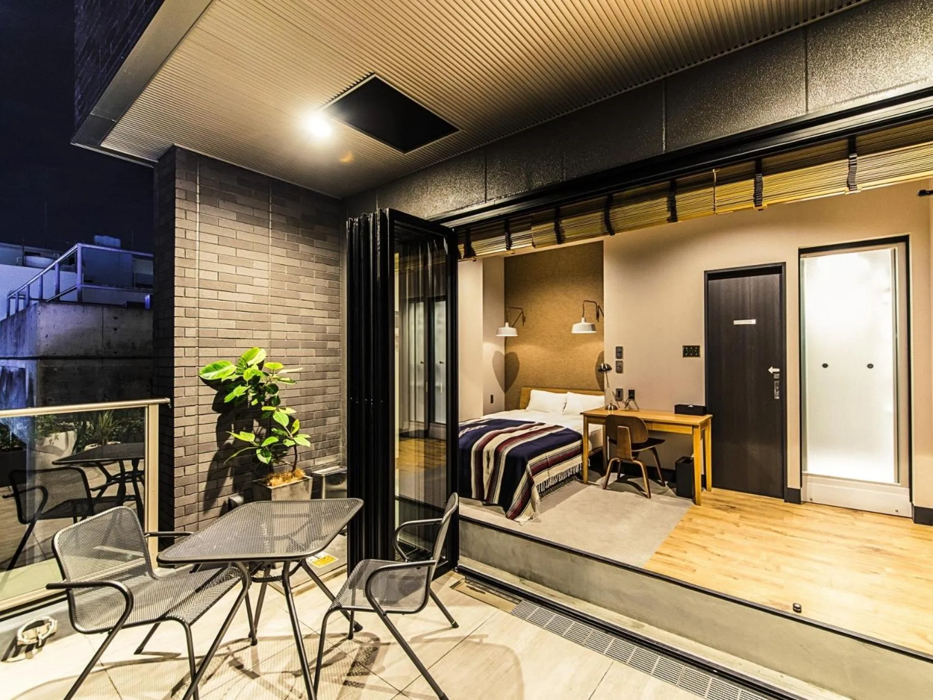 Living room, Bed in H HOTEL