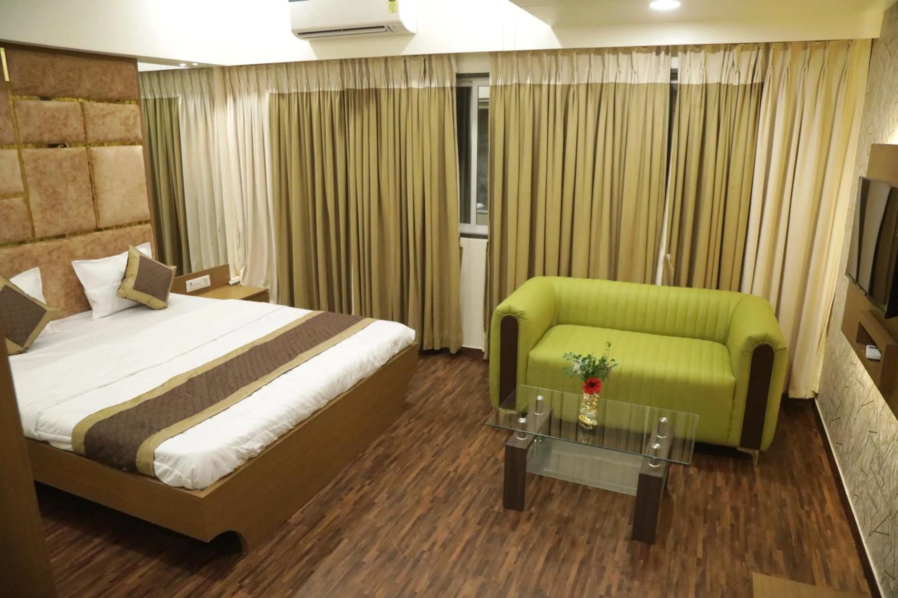 Bed in Hotel M Residency