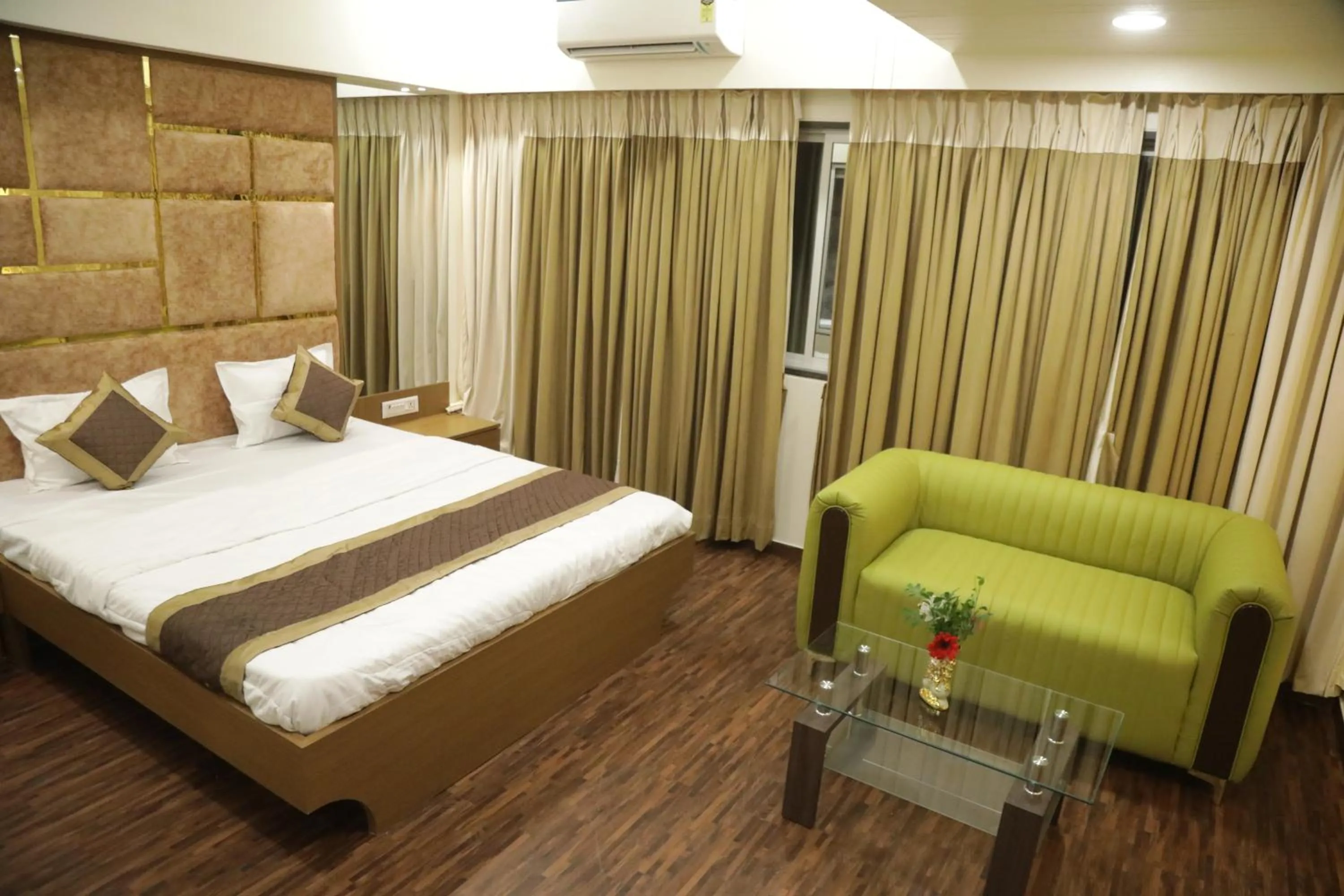 Bed in Hotel M Residency