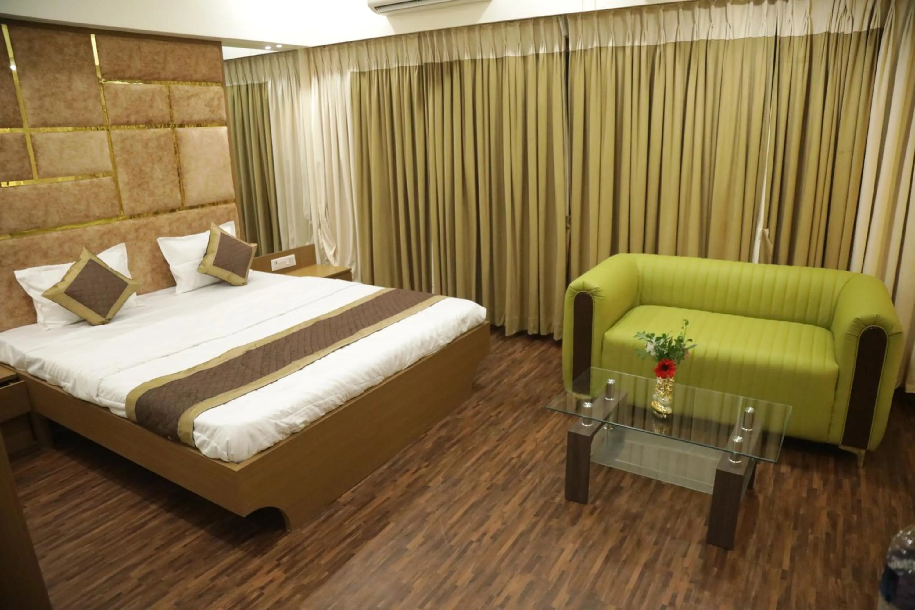 Bed in Hotel M Residency