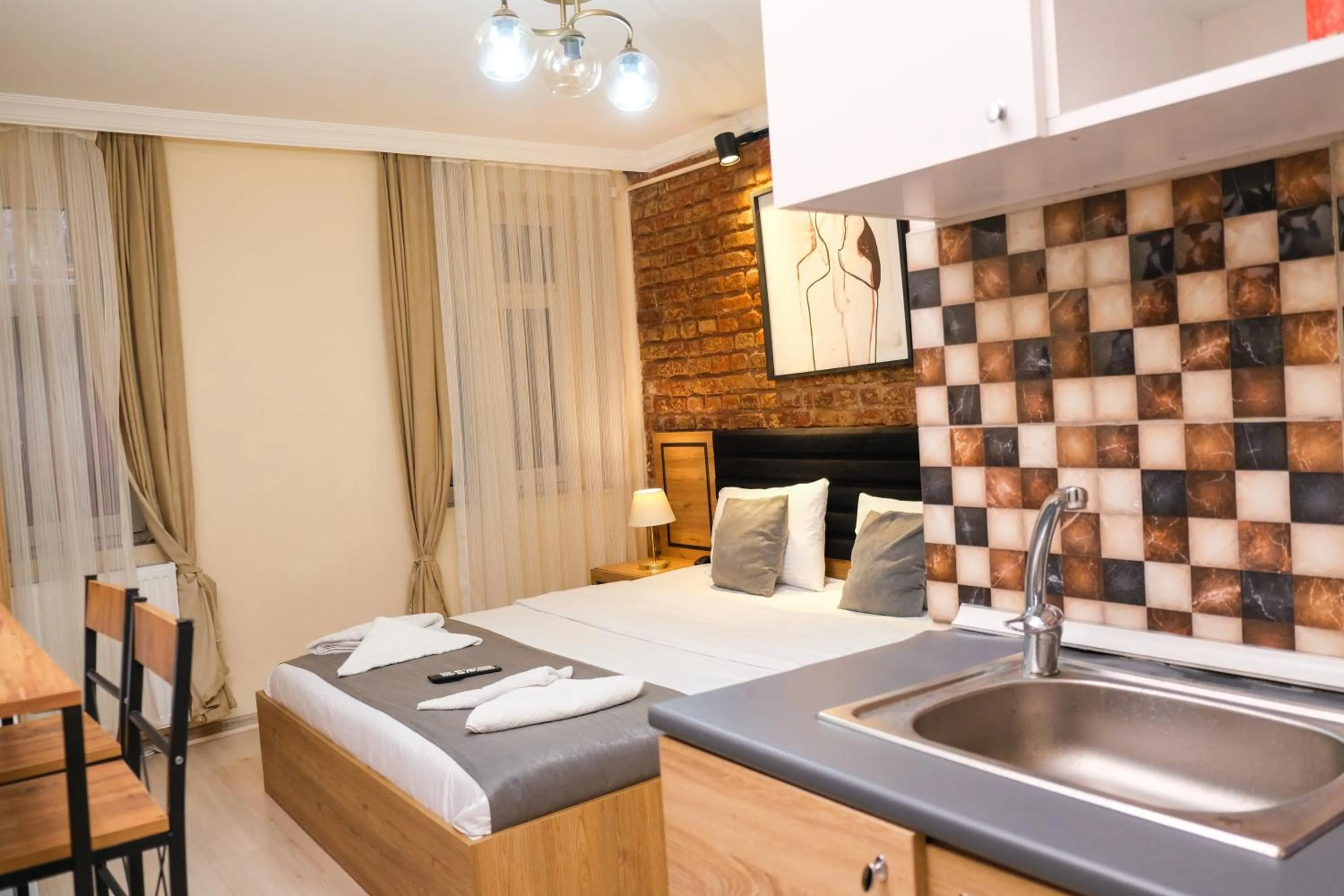 Bed in Taksim Nikea Suites 80