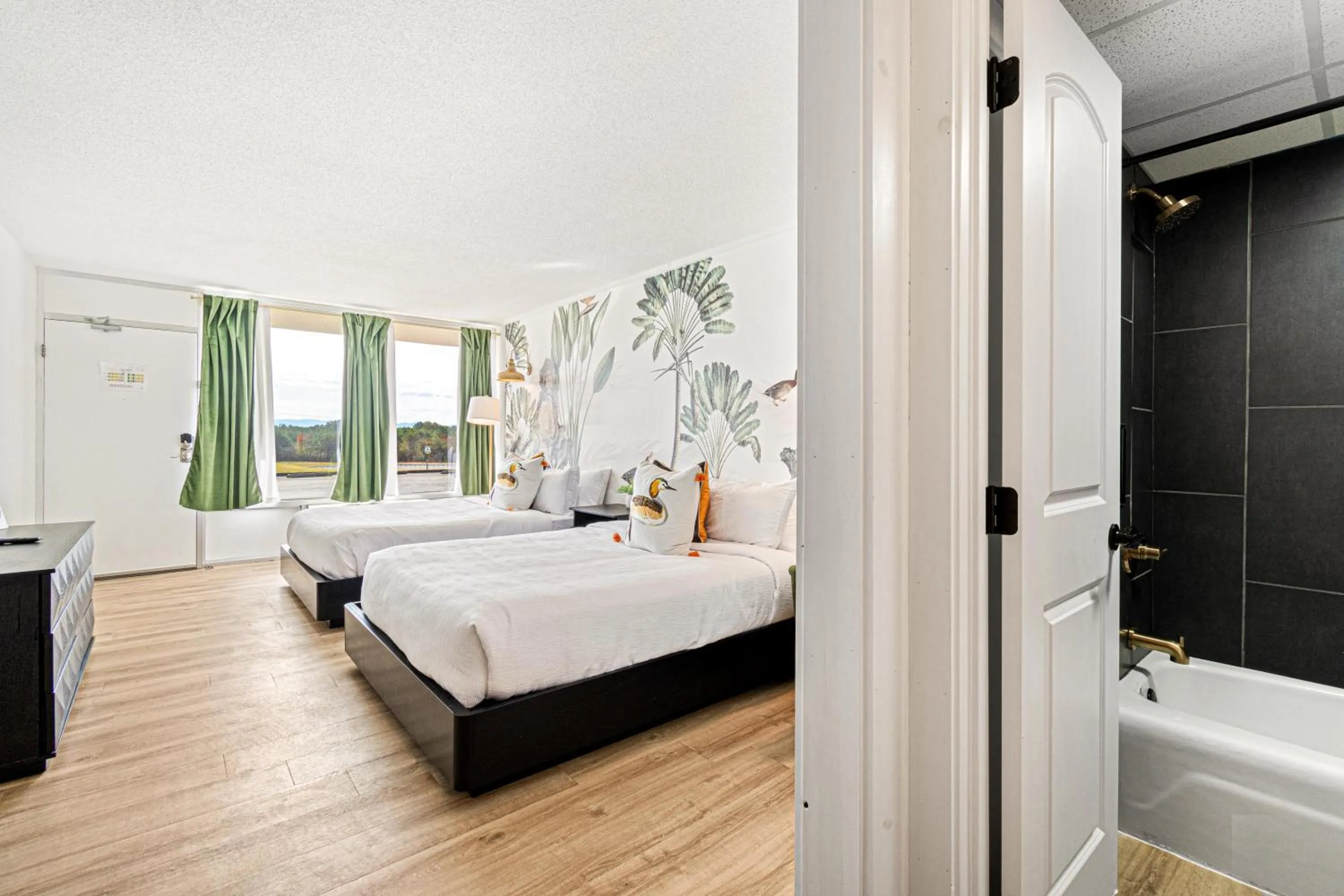 Bed in The Mallard Hotel & Suites