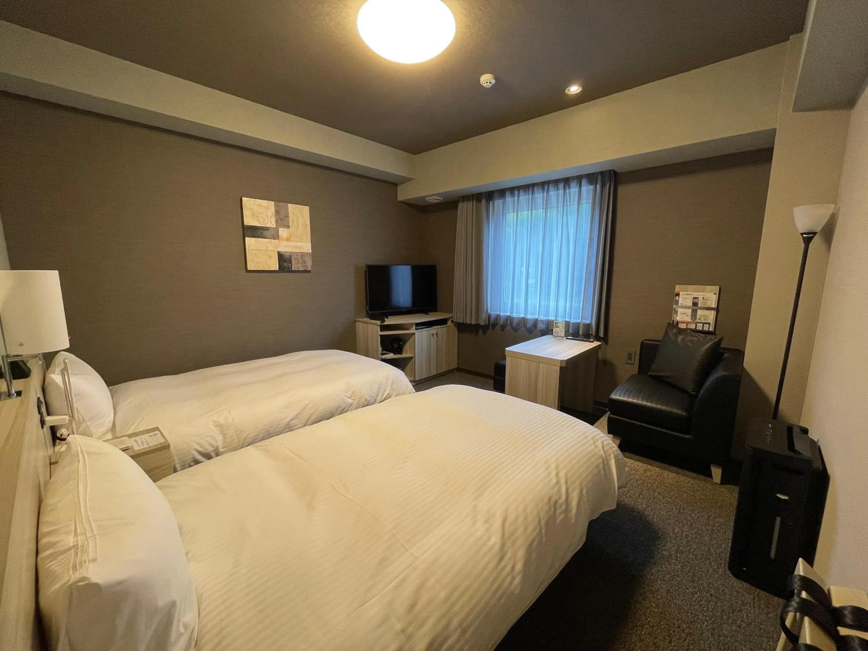 Photo of the whole room, Bed in Hotel Route Inn Ohi Takahama