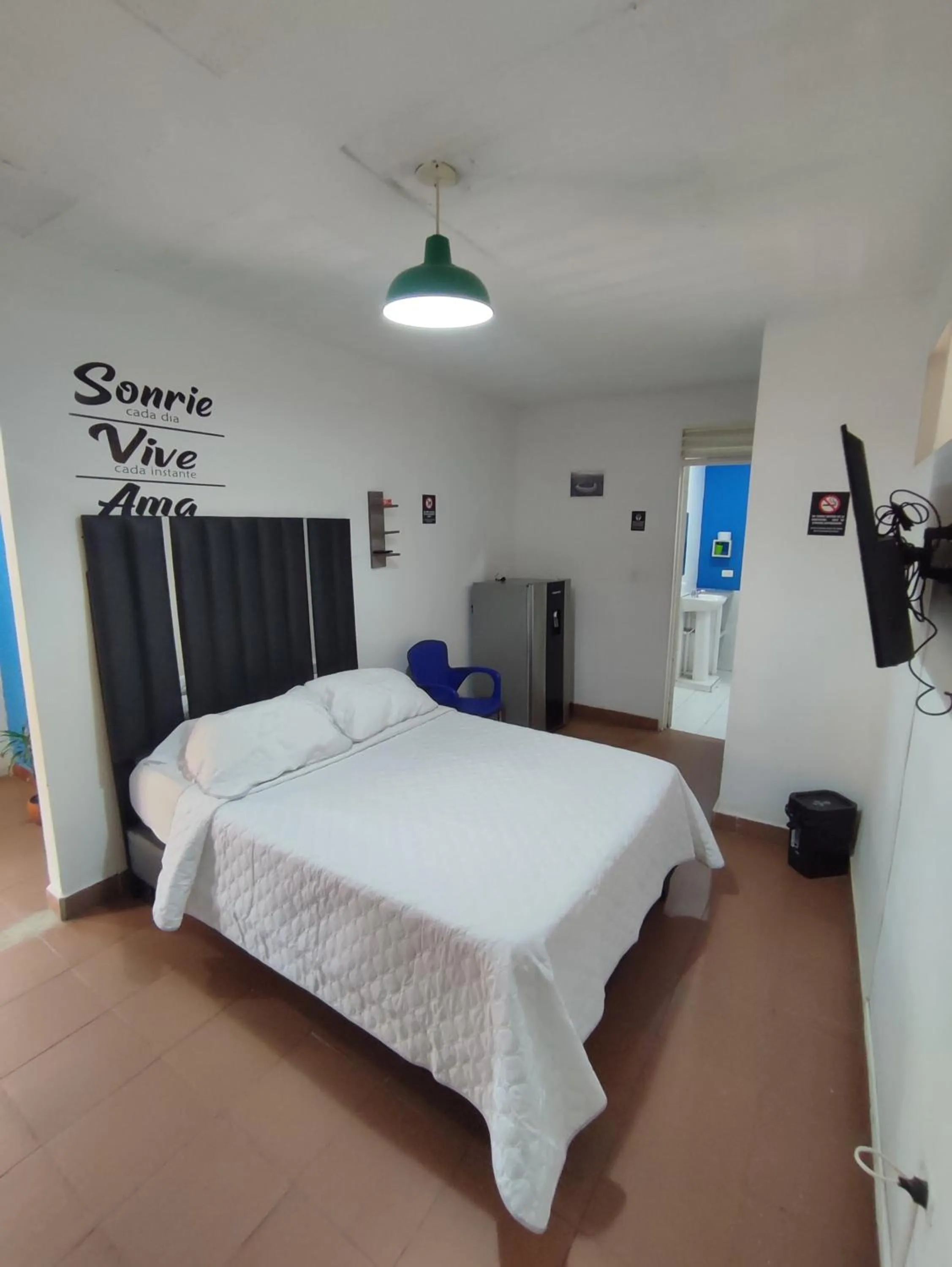 Bed in OUR HOME SAN ANTONIO