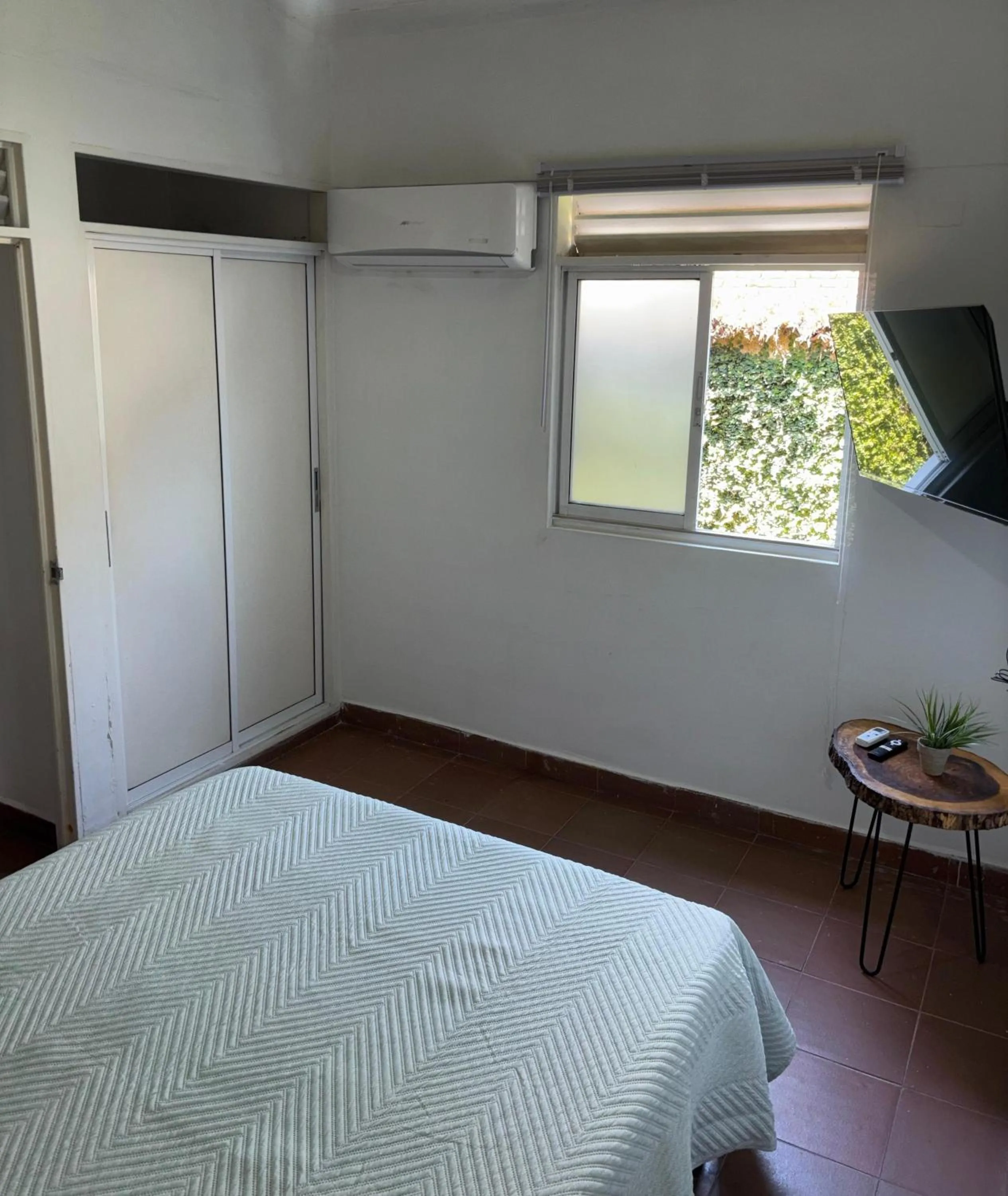 Bed in OUR HOME SAN ANTONIO