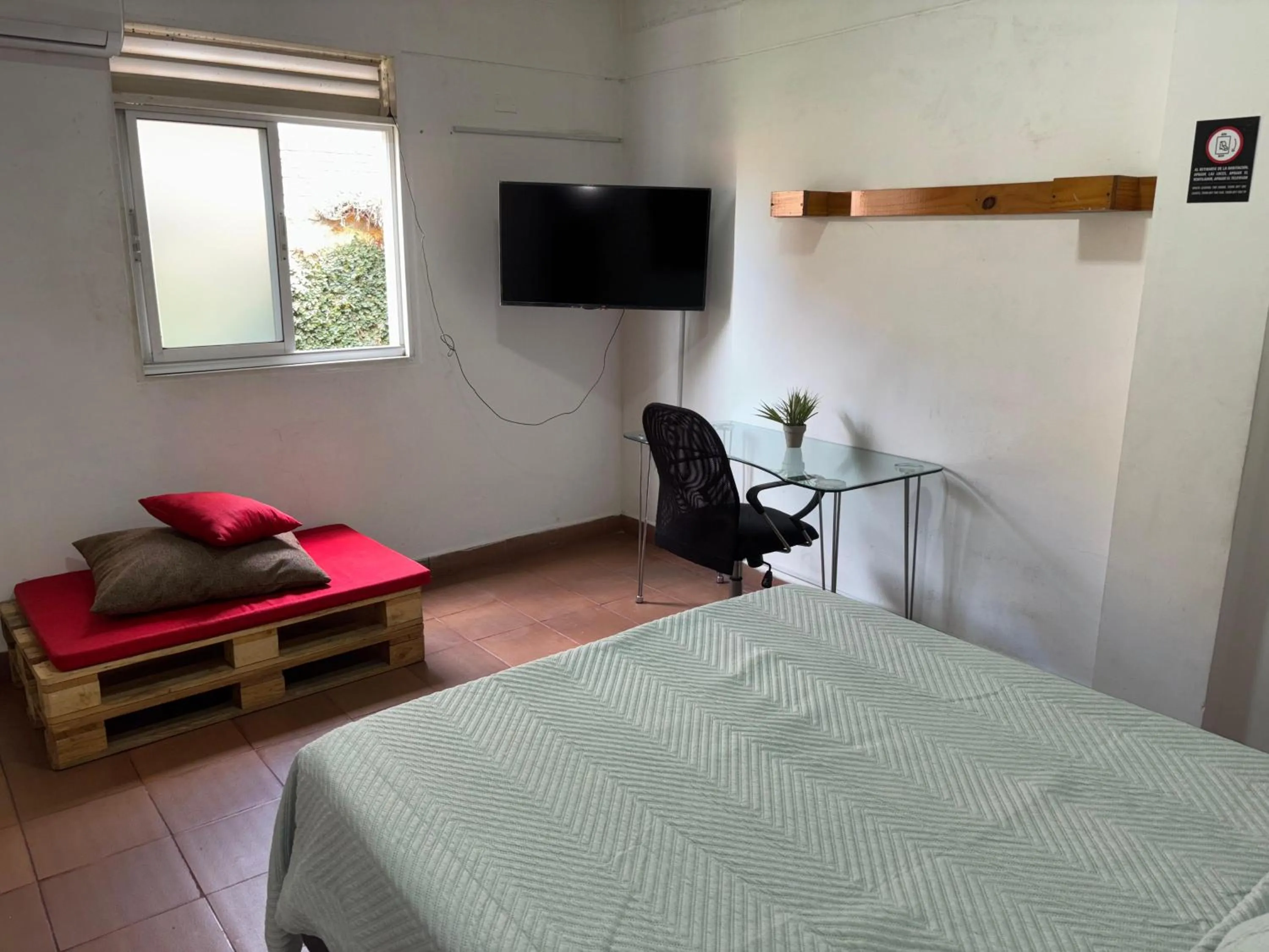 Bed in OUR HOME SAN ANTONIO