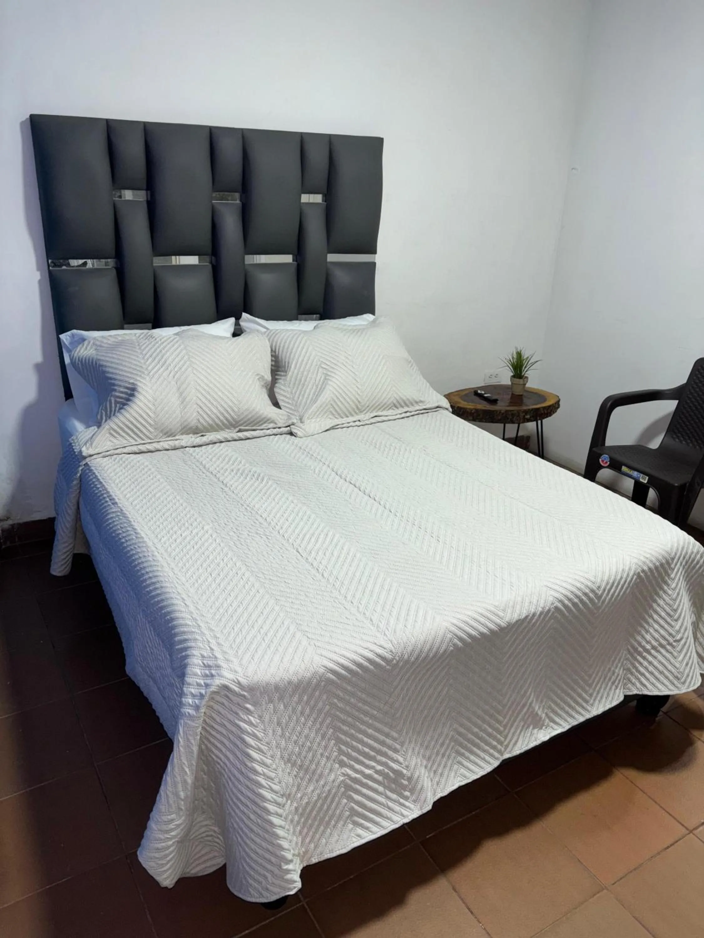 Bed in OUR HOME SAN ANTONIO