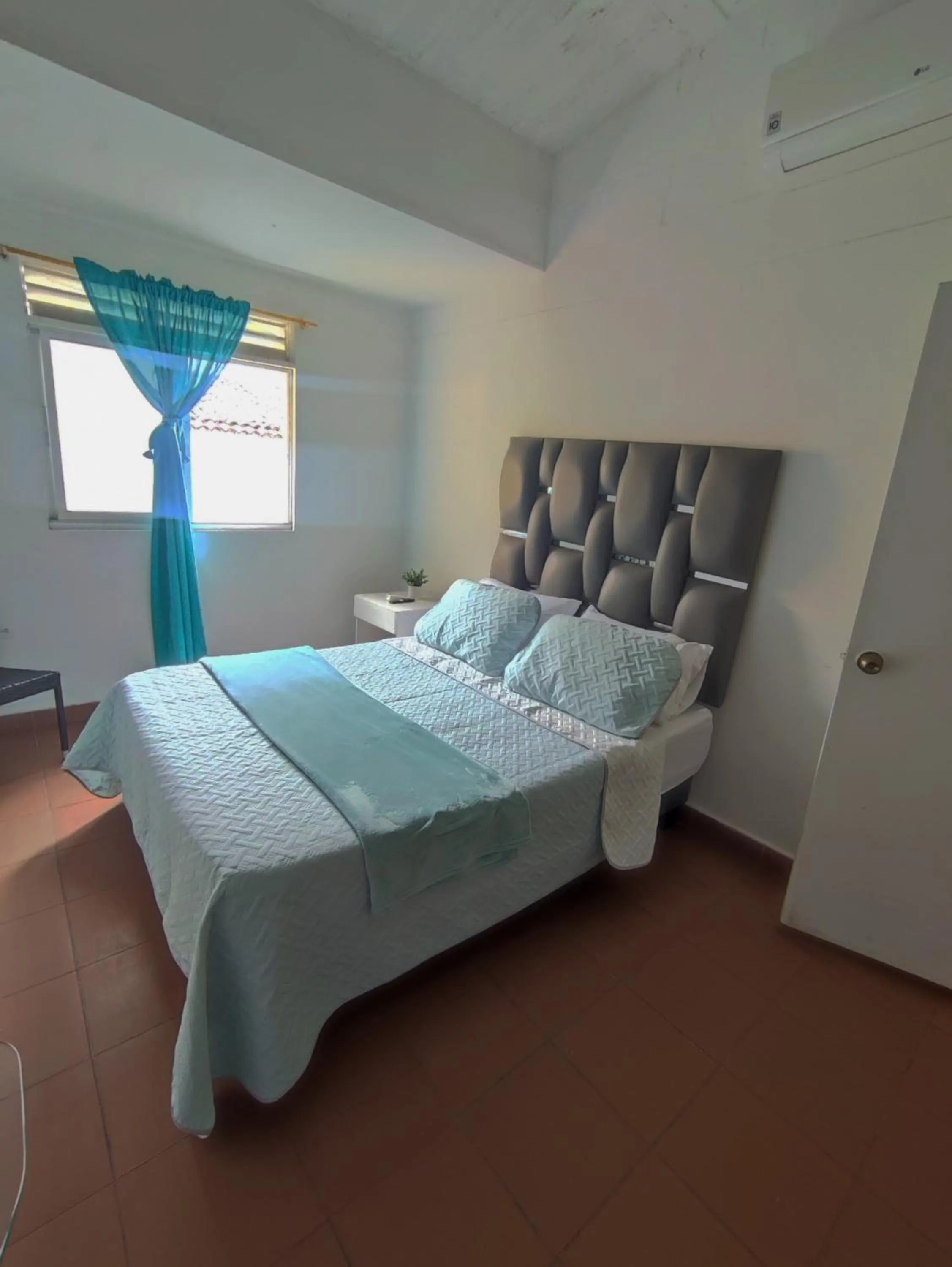 Bed in OUR HOME SAN ANTONIO