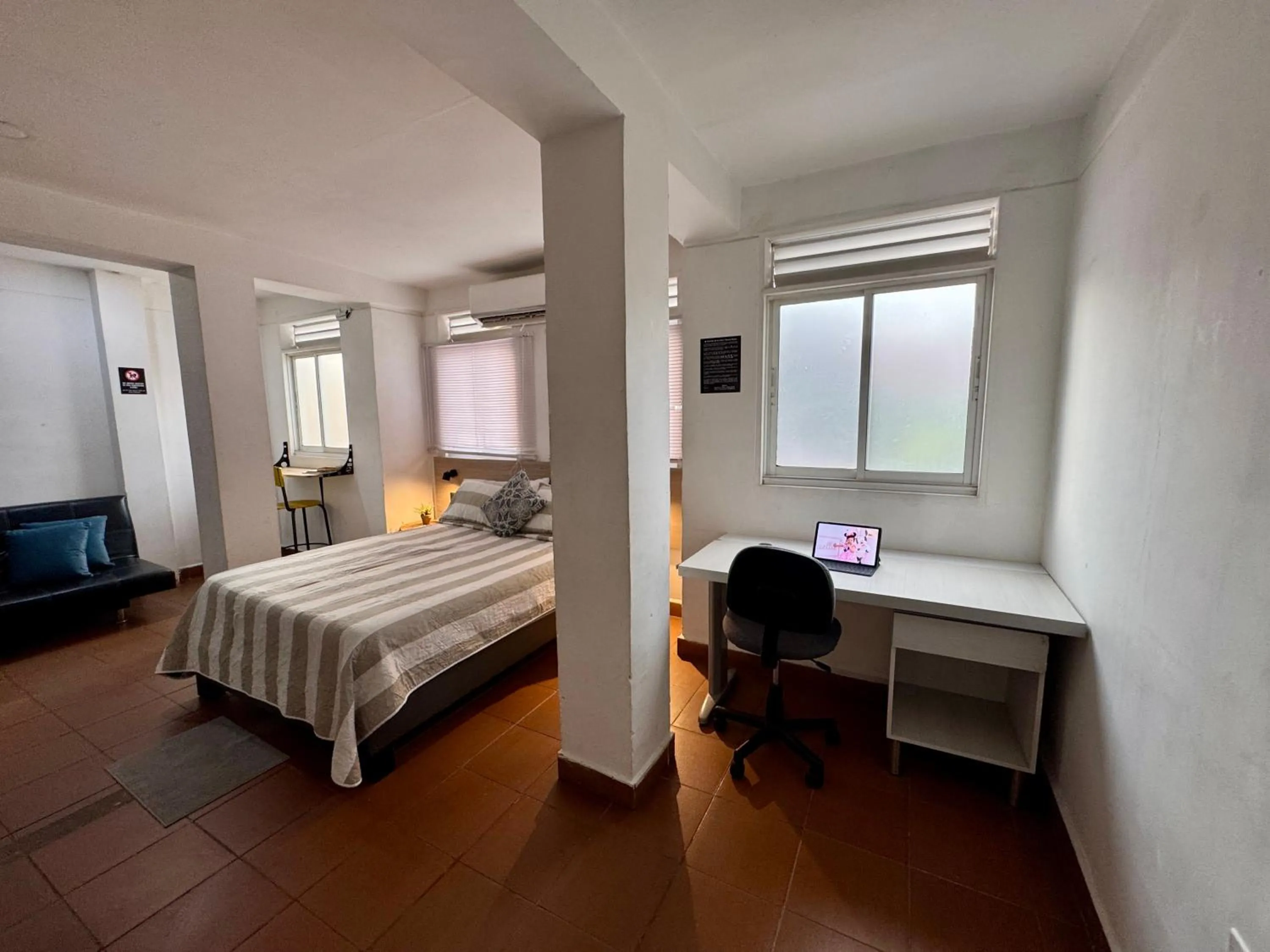 Bed in OUR HOME SAN ANTONIO