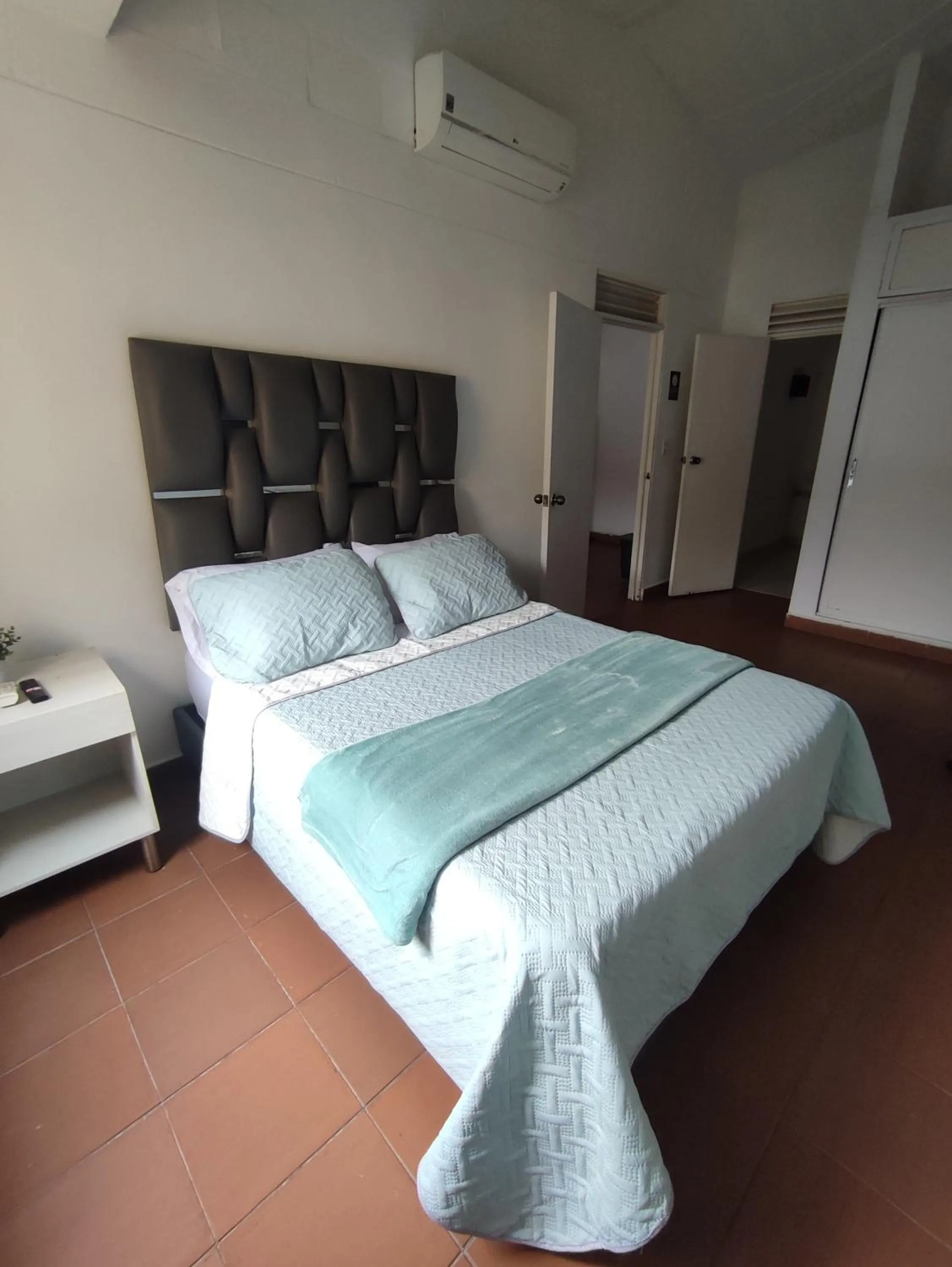 Bed in OUR HOME SAN ANTONIO