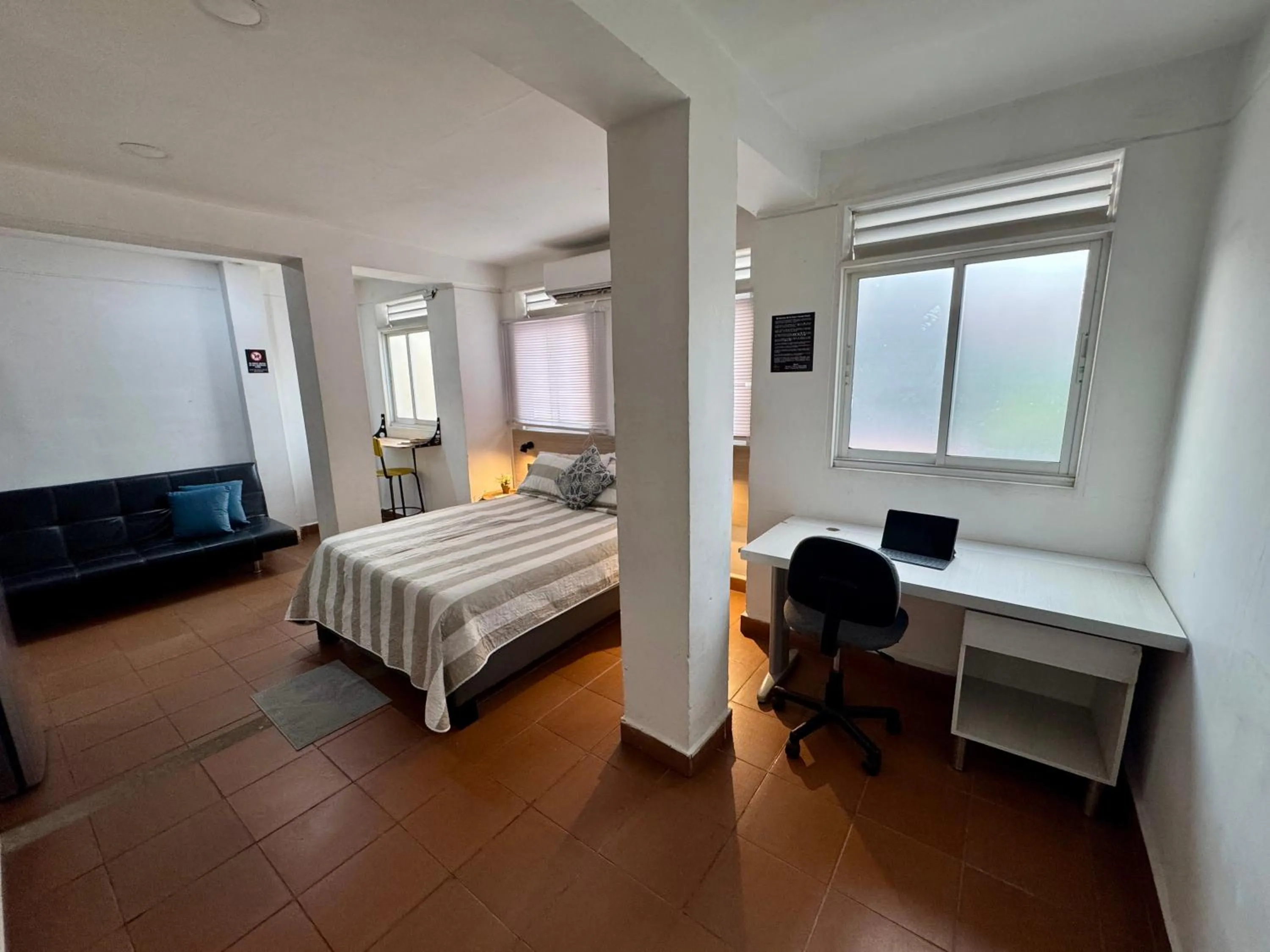 Bed in OUR HOME SAN ANTONIO