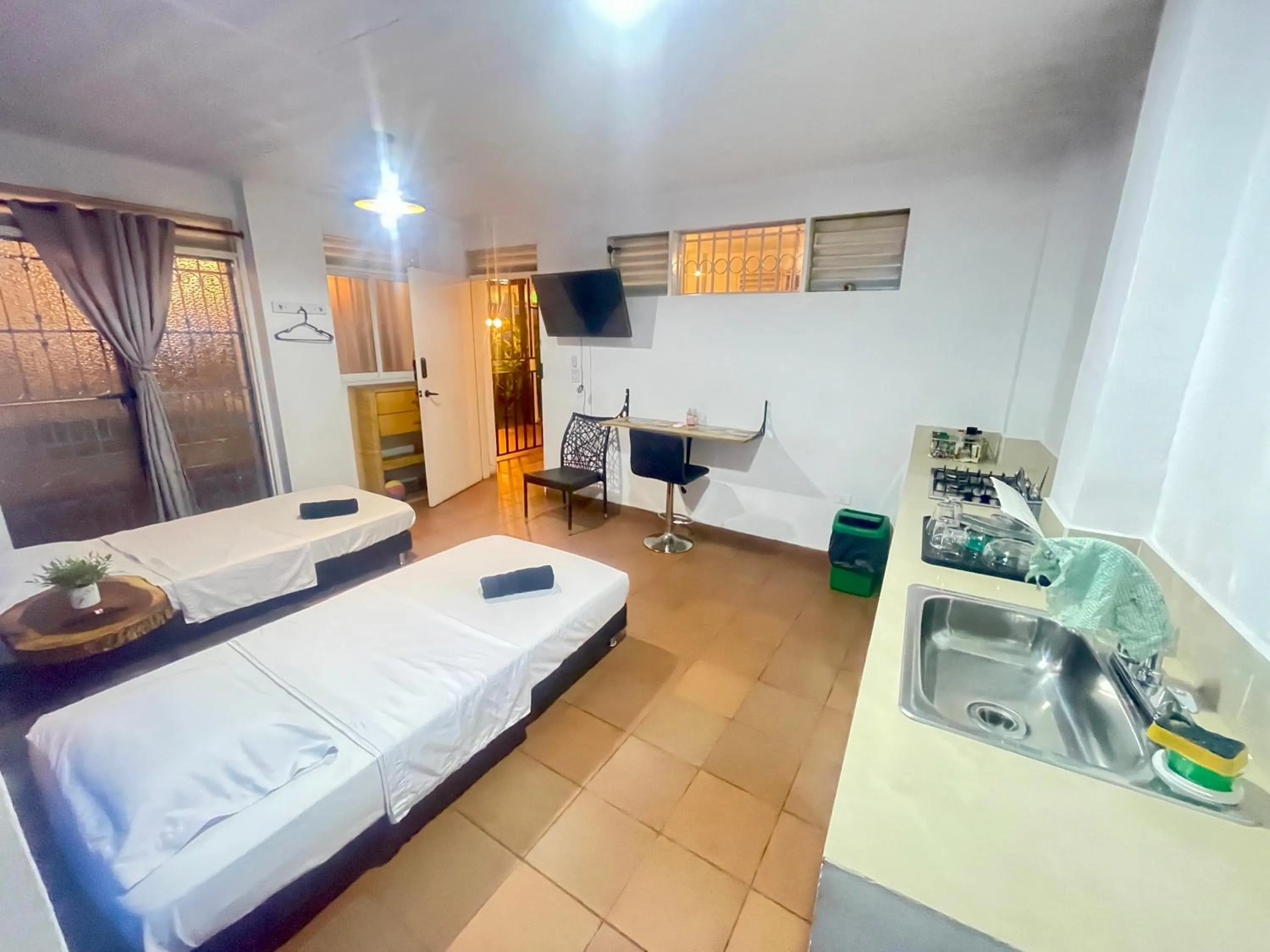 Bed in OUR HOME SAN ANTONIO