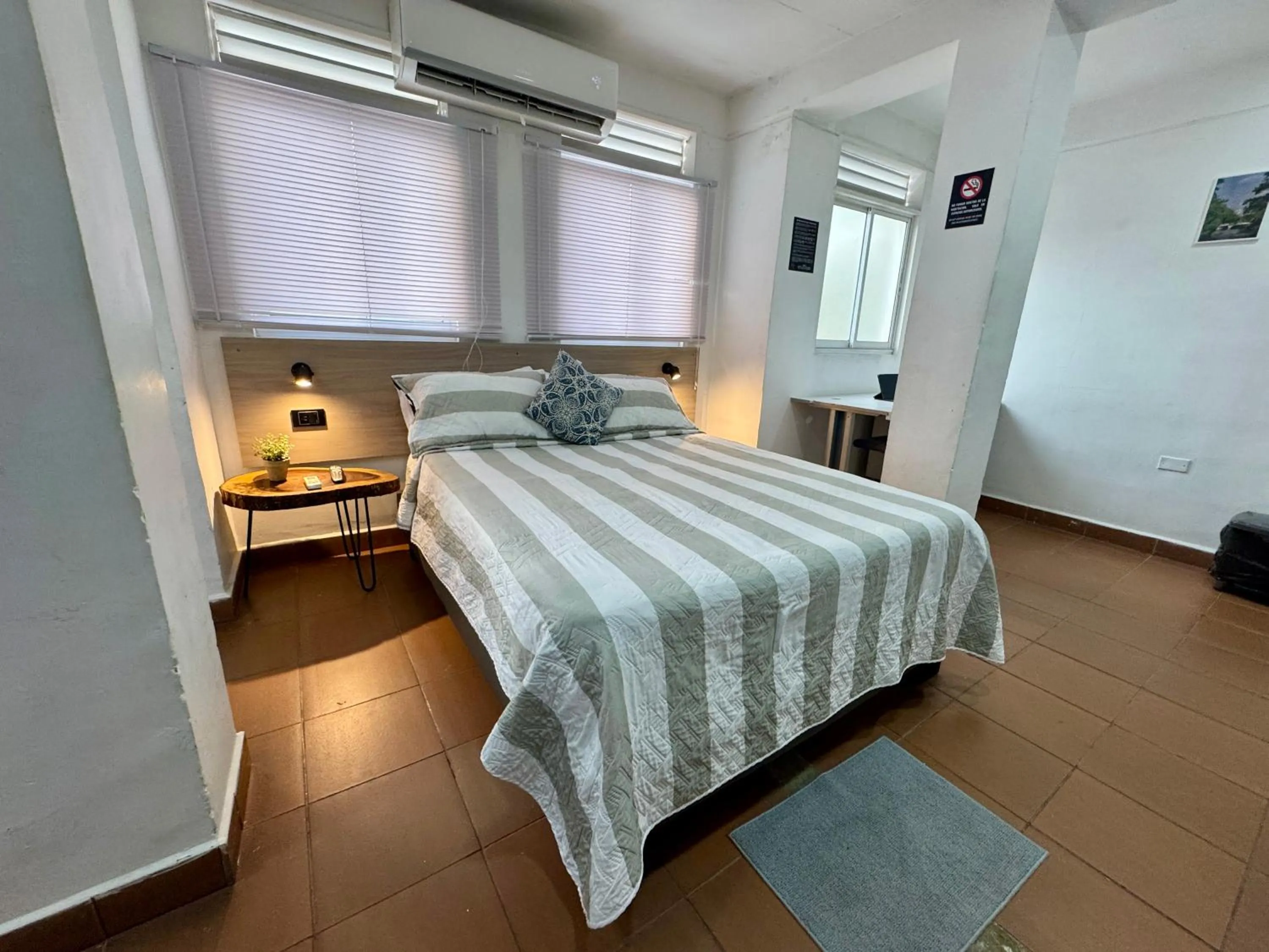 Bed in OUR HOME SAN ANTONIO