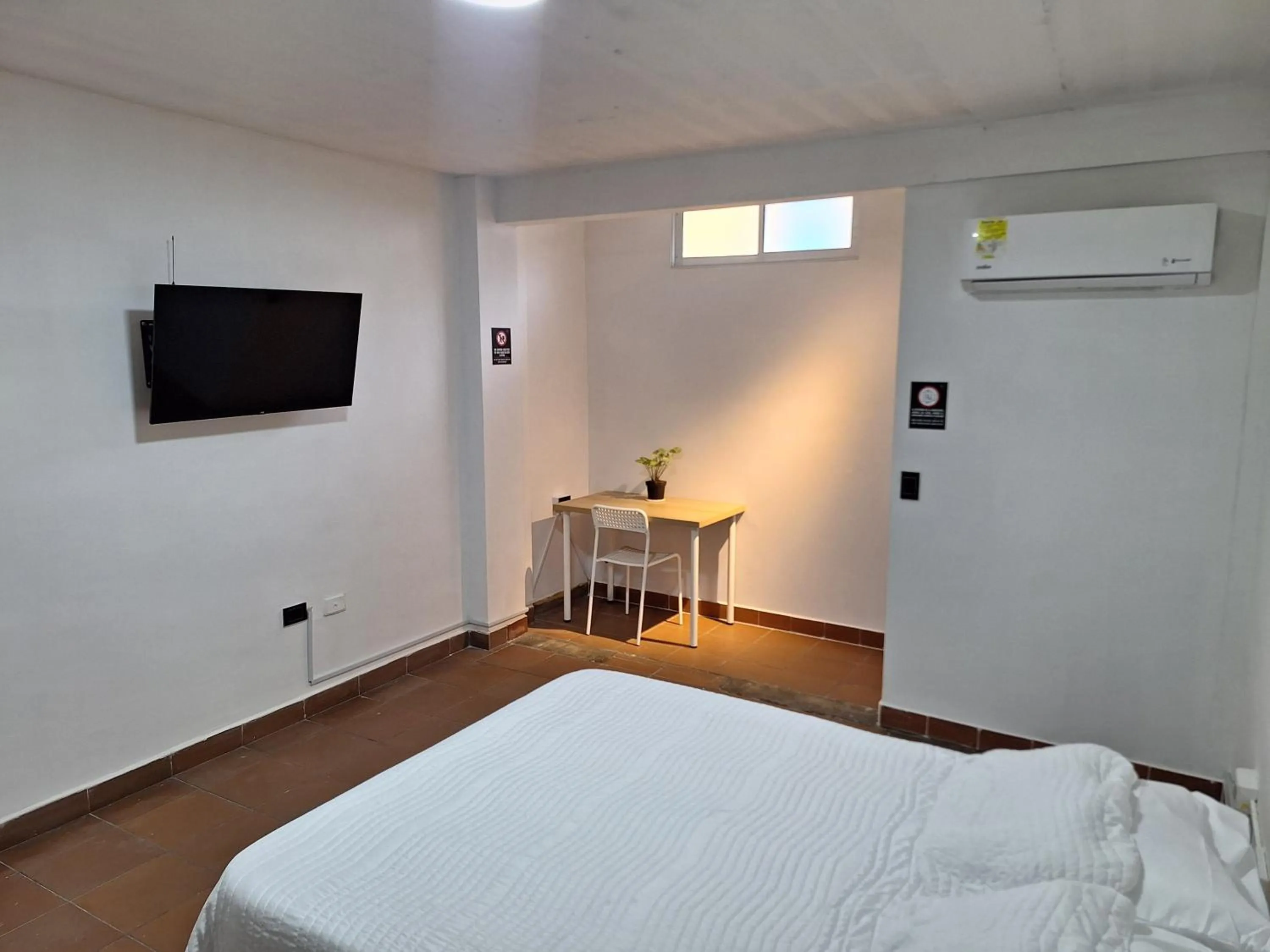 Bed in OUR HOME SAN ANTONIO