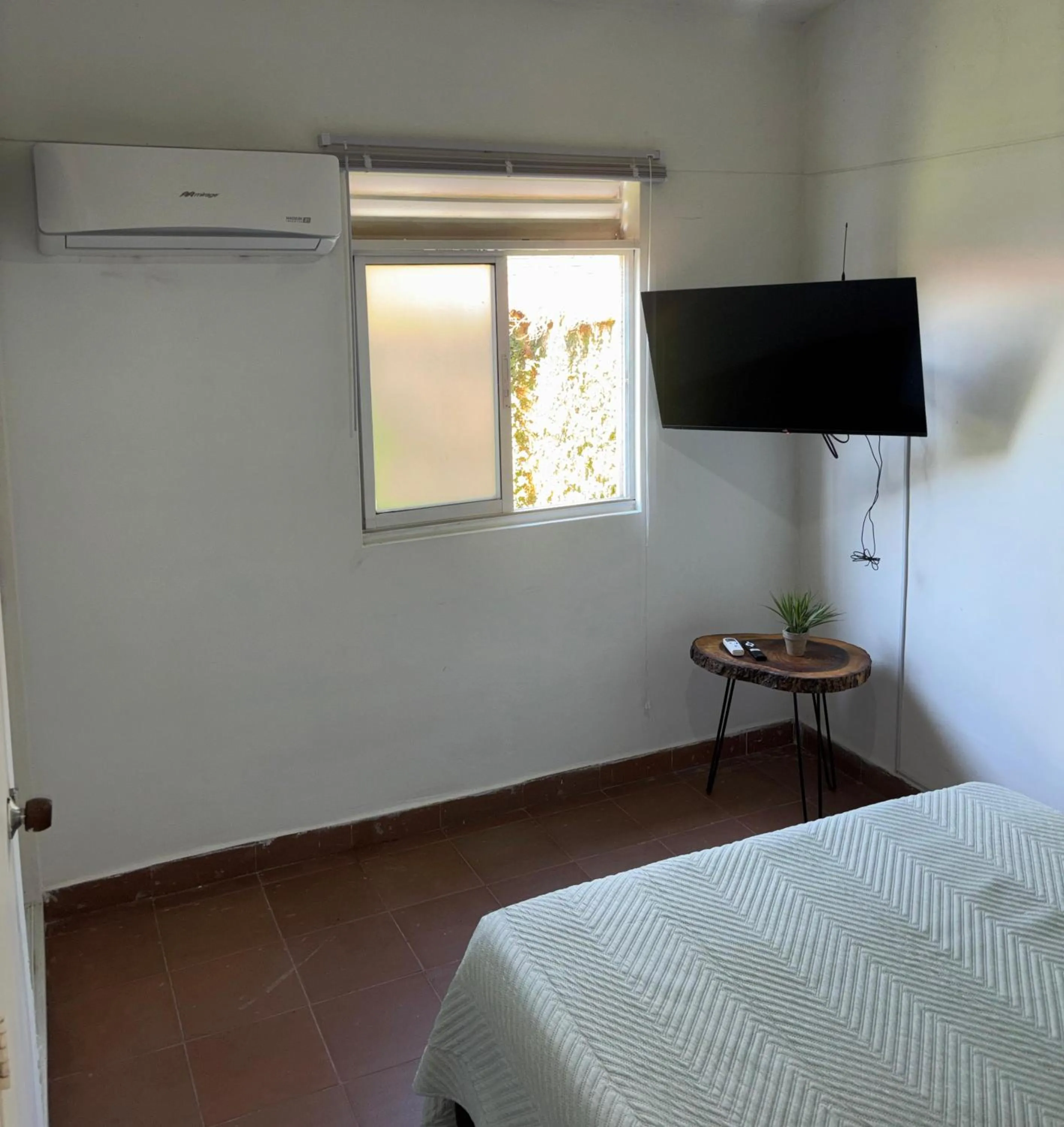 Bed in OUR HOME SAN ANTONIO