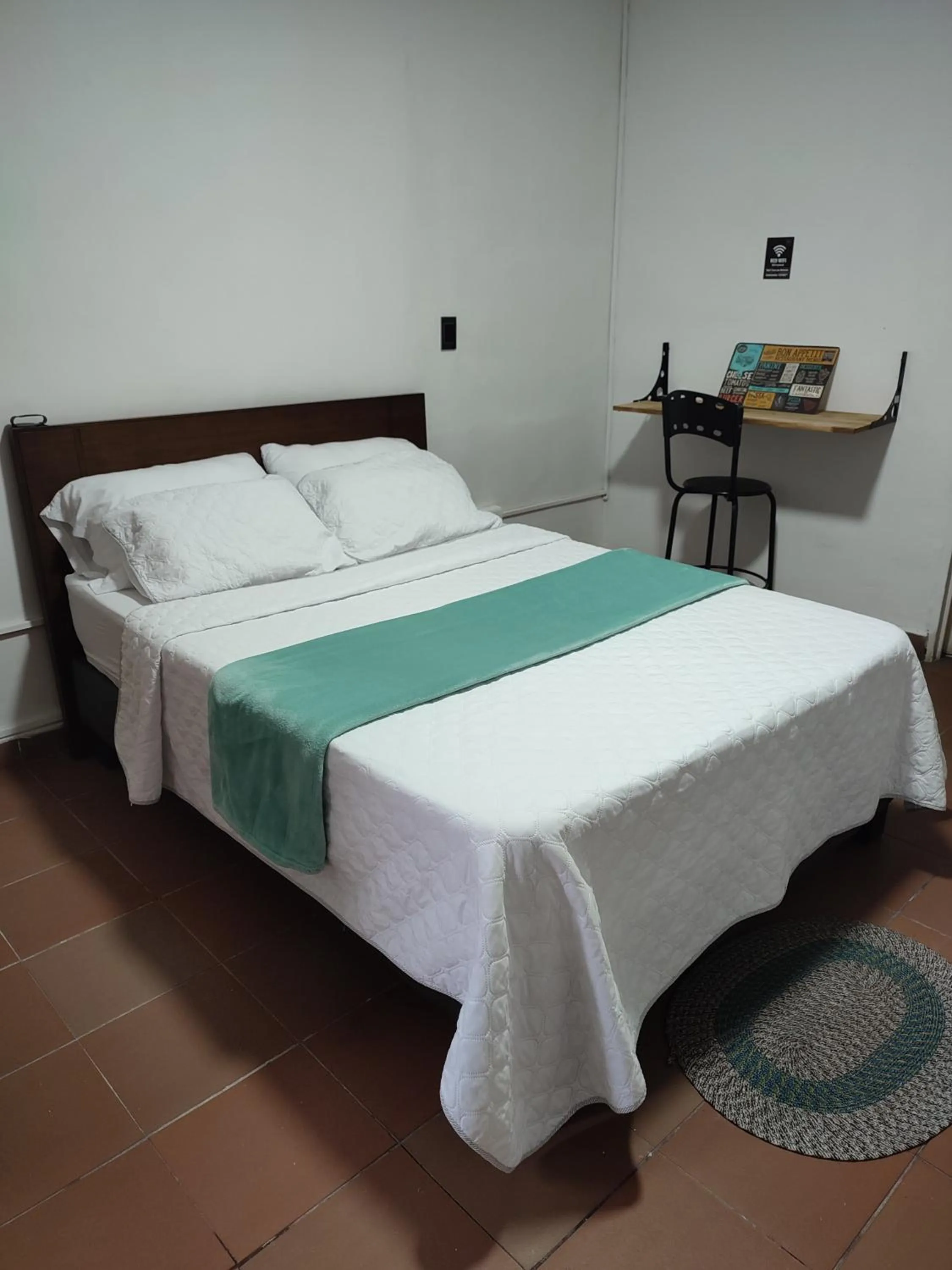 Bed in OUR HOME SAN ANTONIO