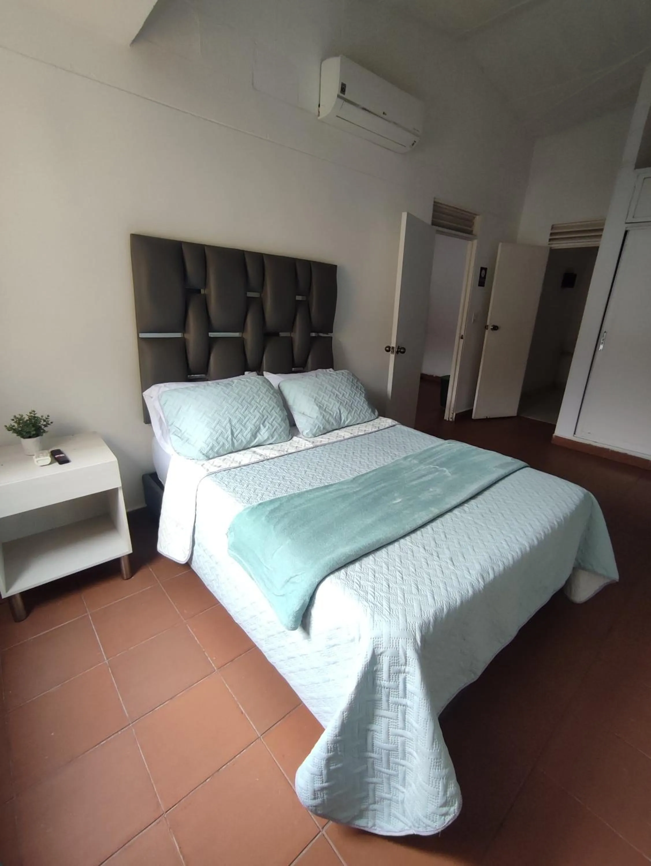 Bed in OUR HOME SAN ANTONIO