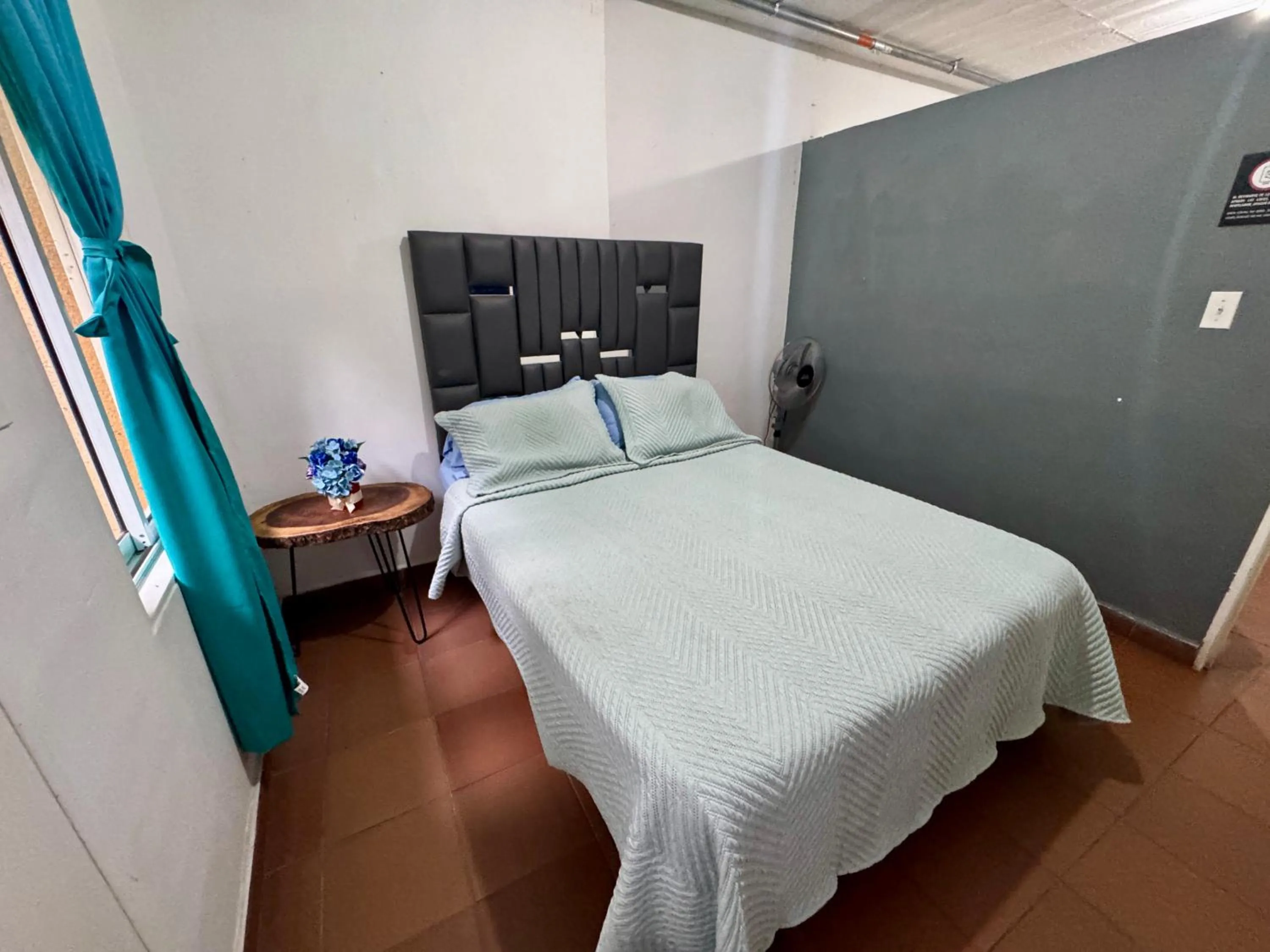 Bed in OUR HOME SAN ANTONIO